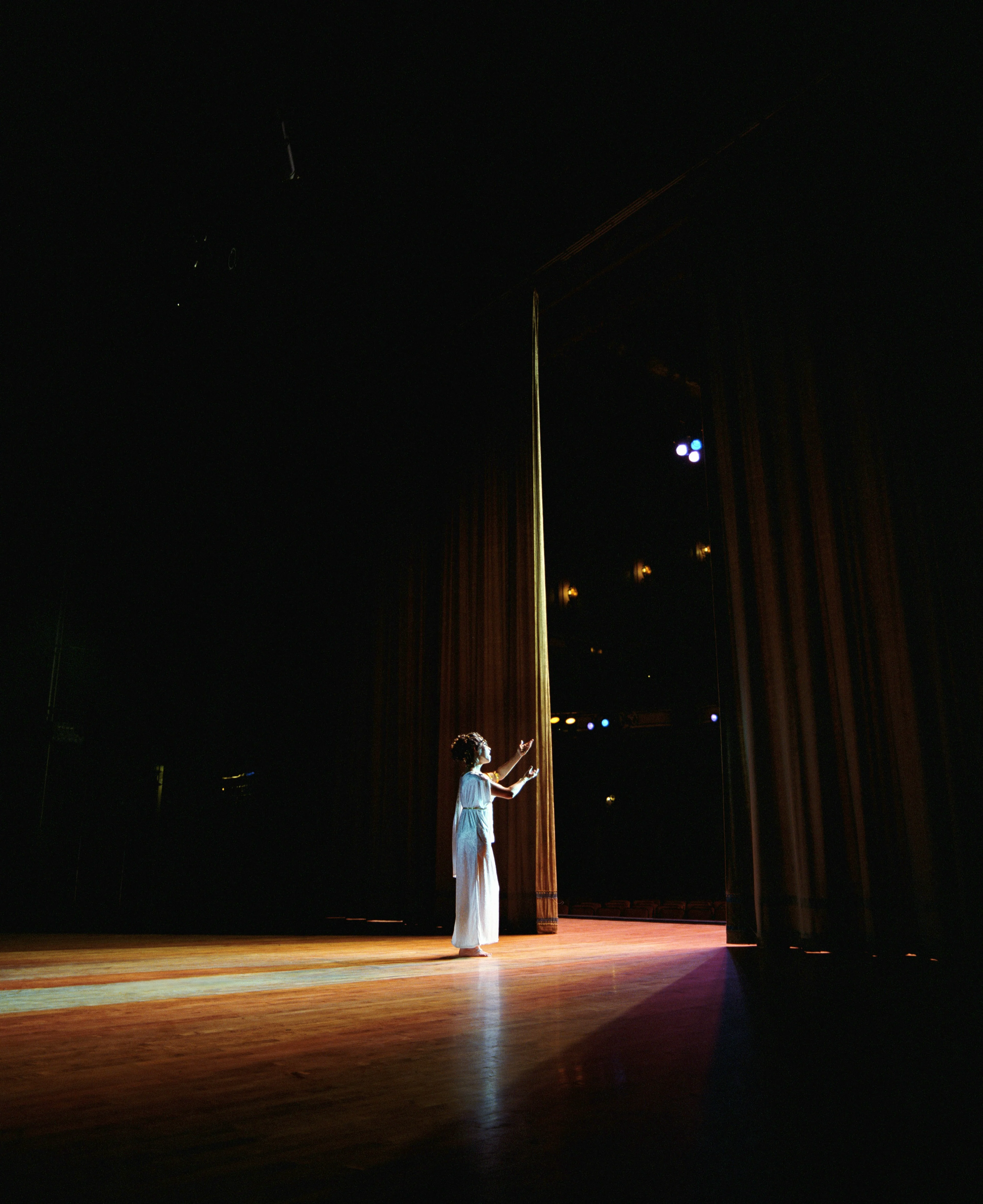 person on stage performing