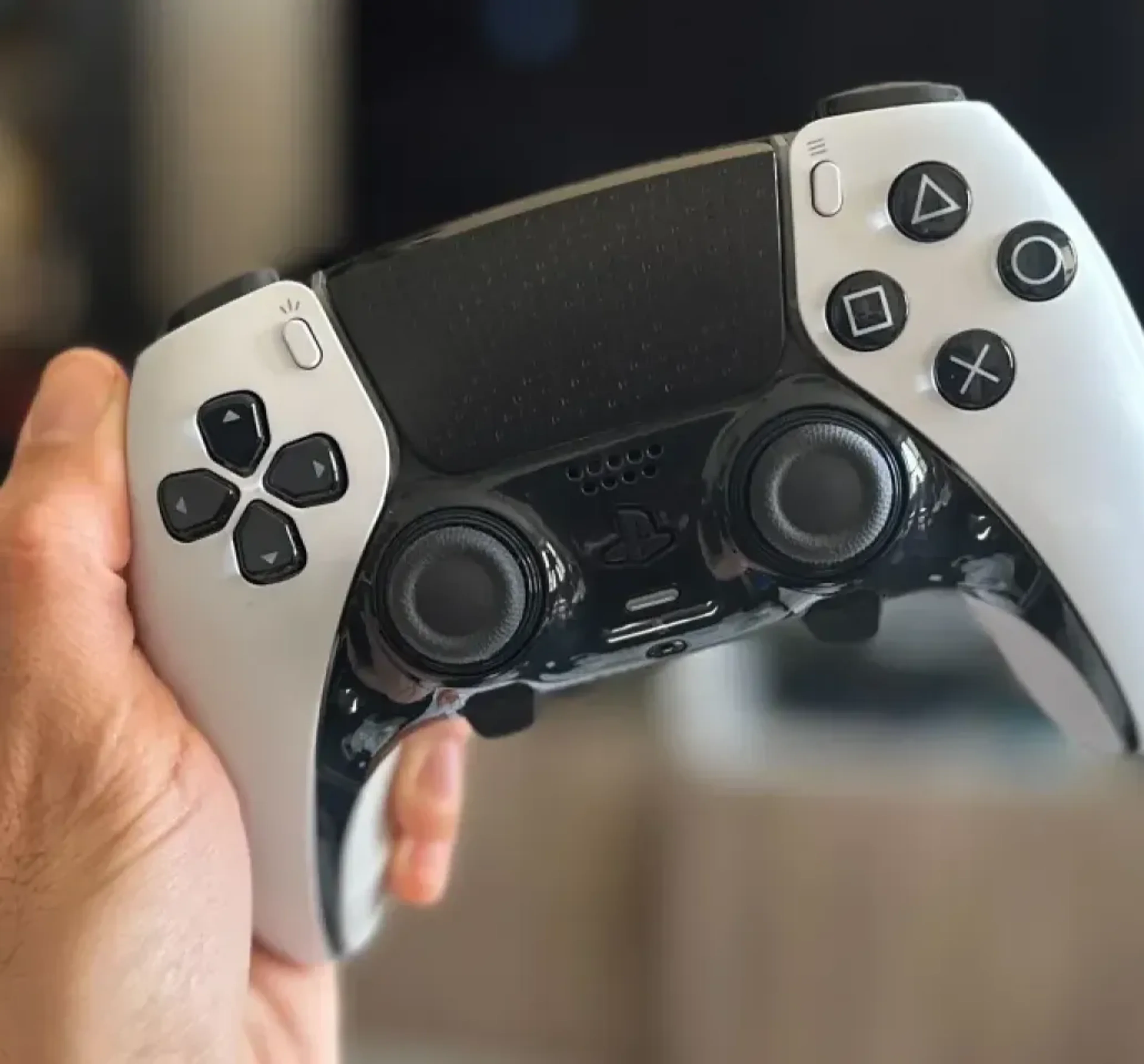 Gaming imagery featuring PlayStation DualSense Edge Wireless Controller