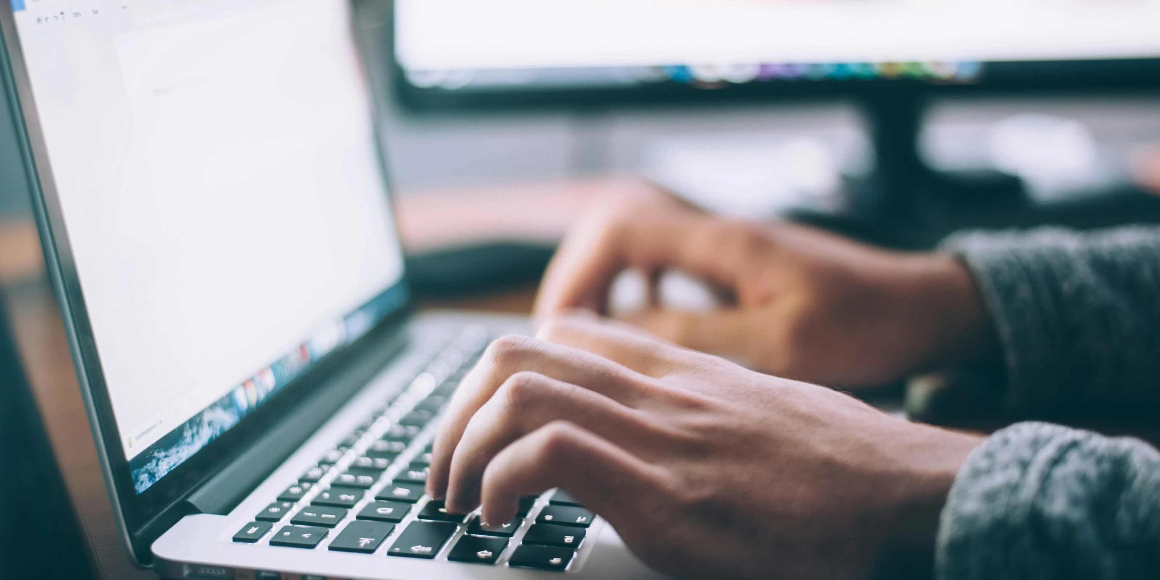 person using MacBook Pro.