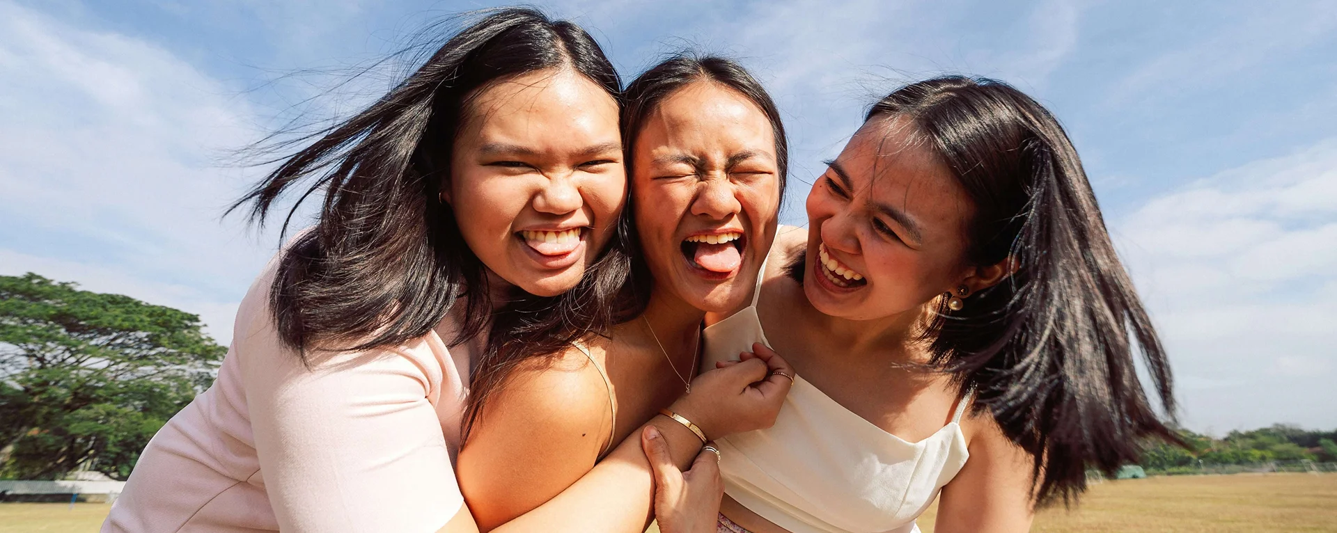 three women laughing