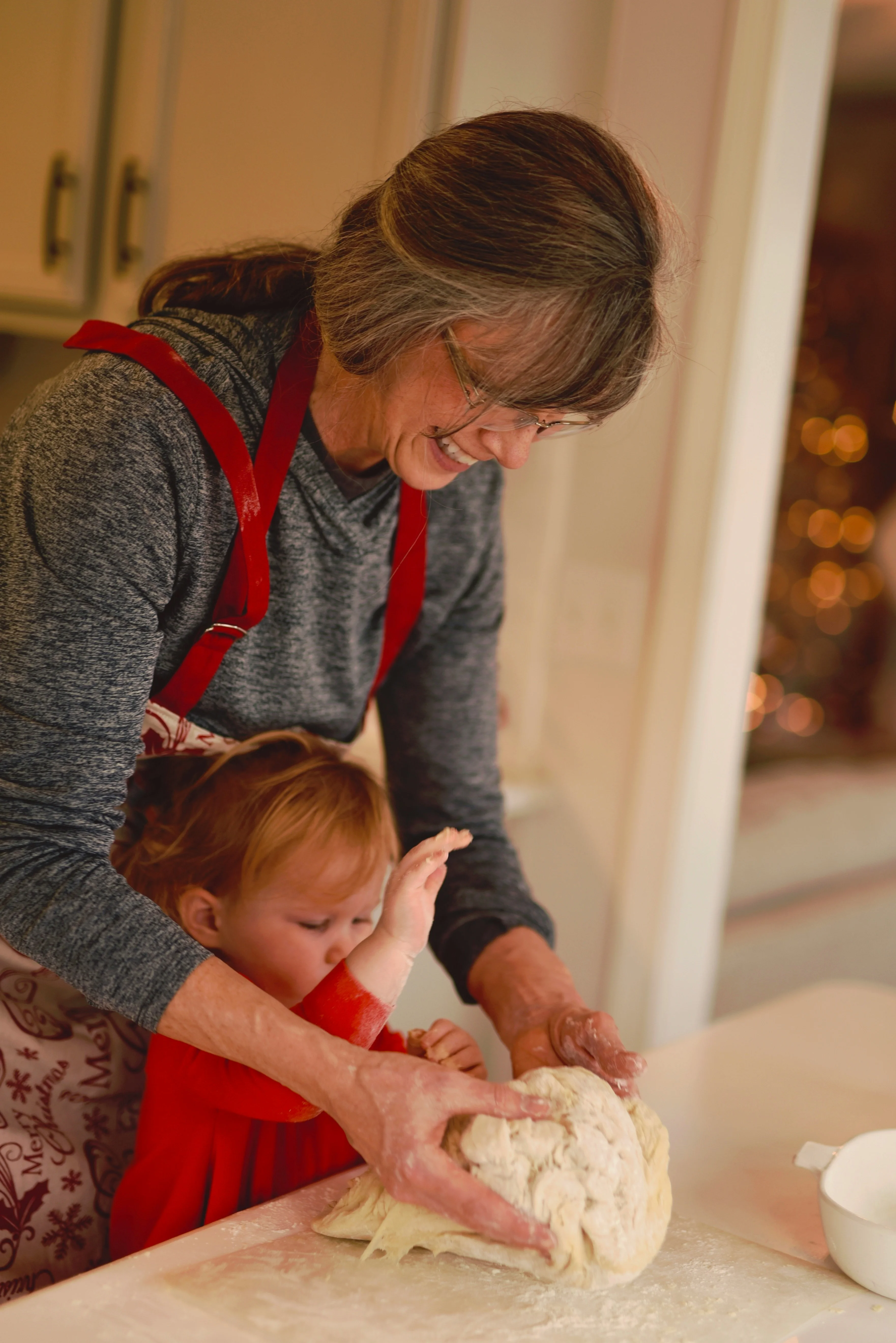 grandma cooking with her grandchild