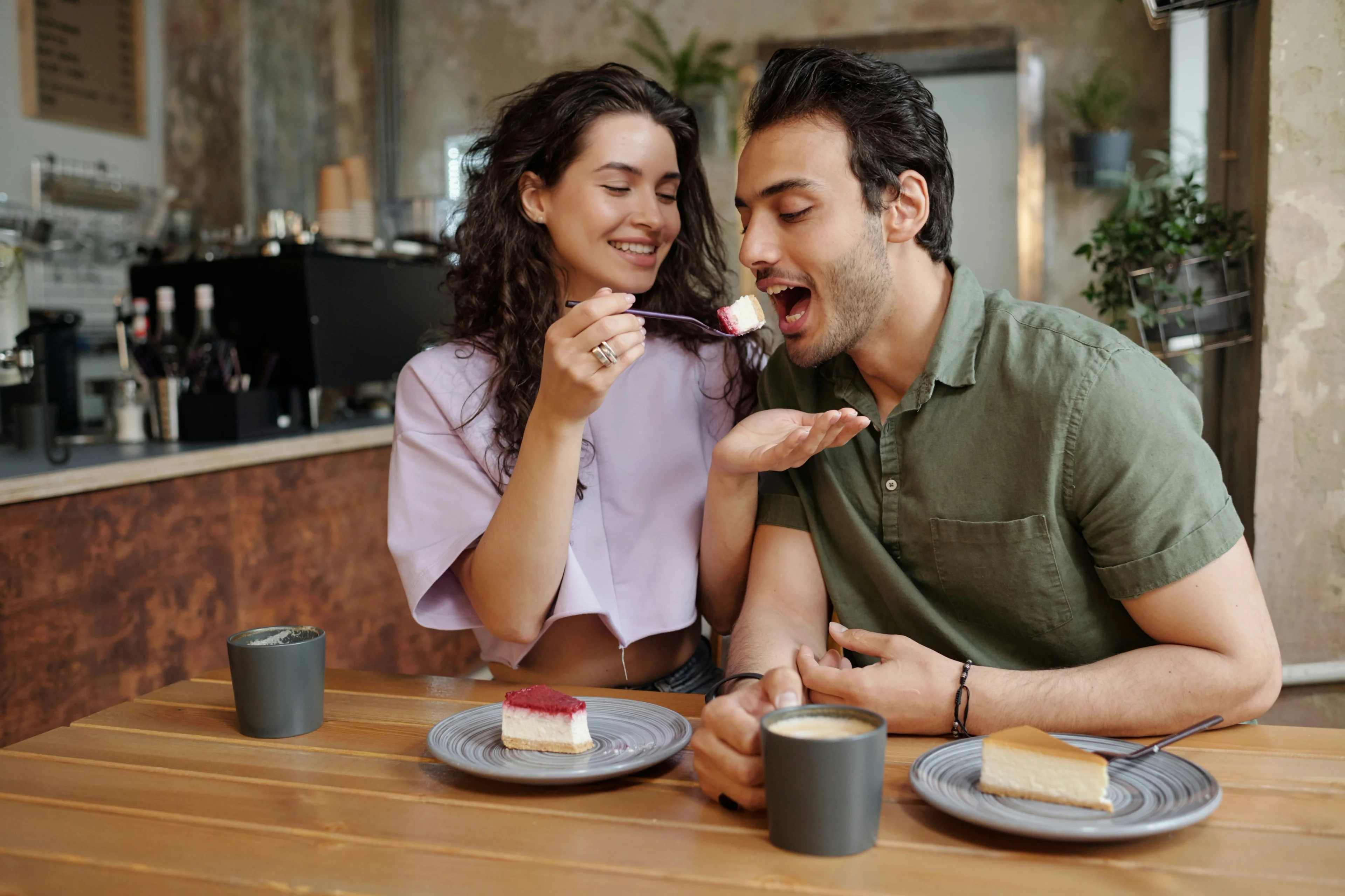 Happy friends eating dessert