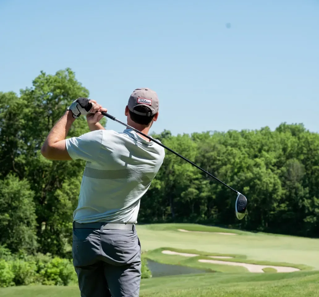 Golf imagery featuring TaylorMade Qi Custom Irons