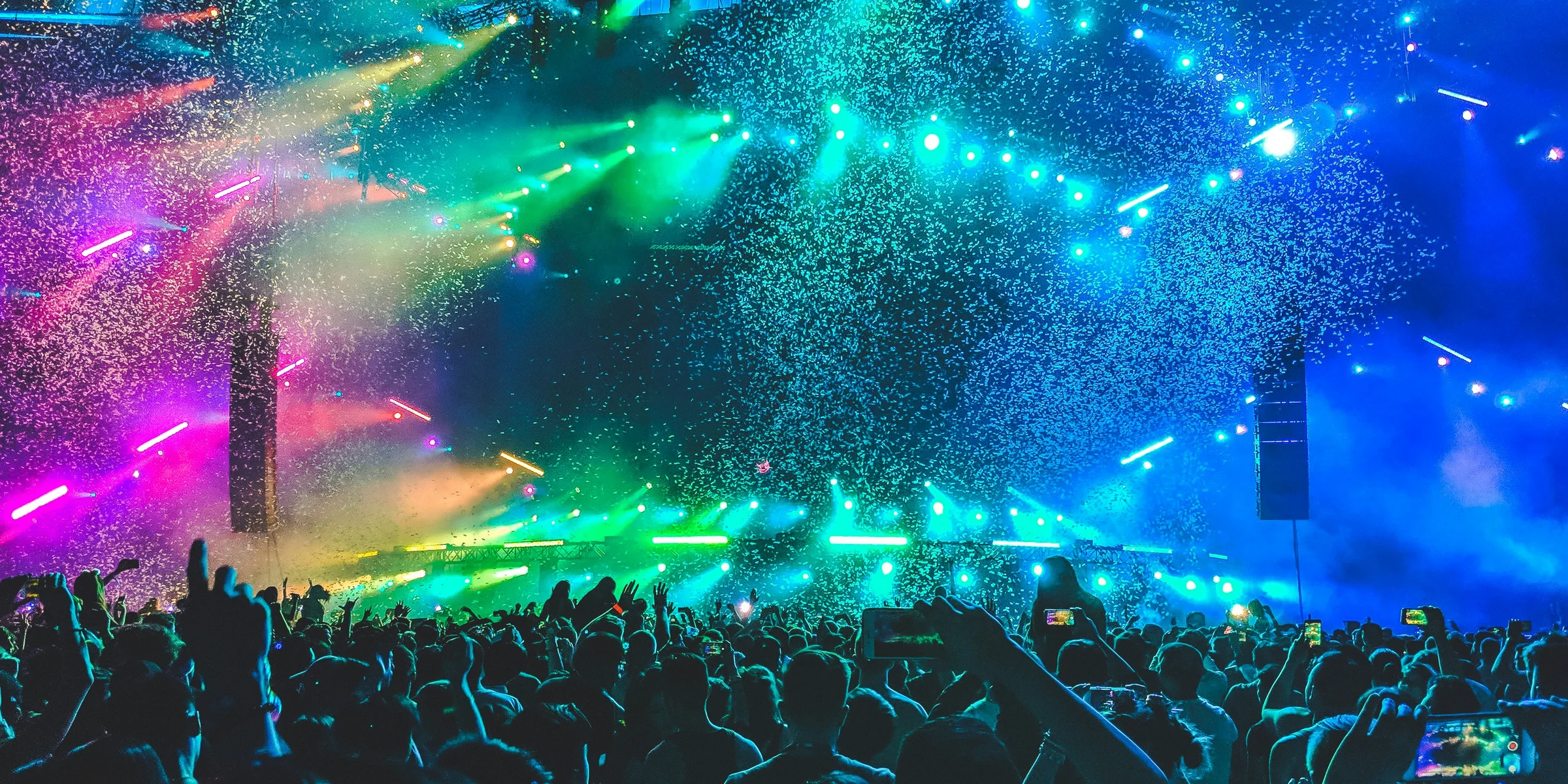 group of people in front of stage