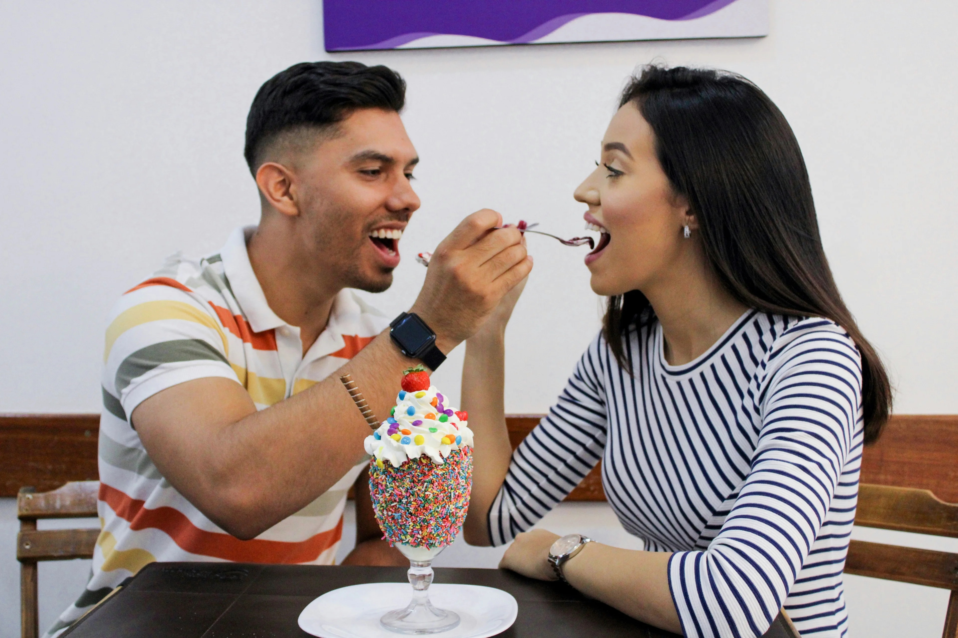 Happy friends with dessert