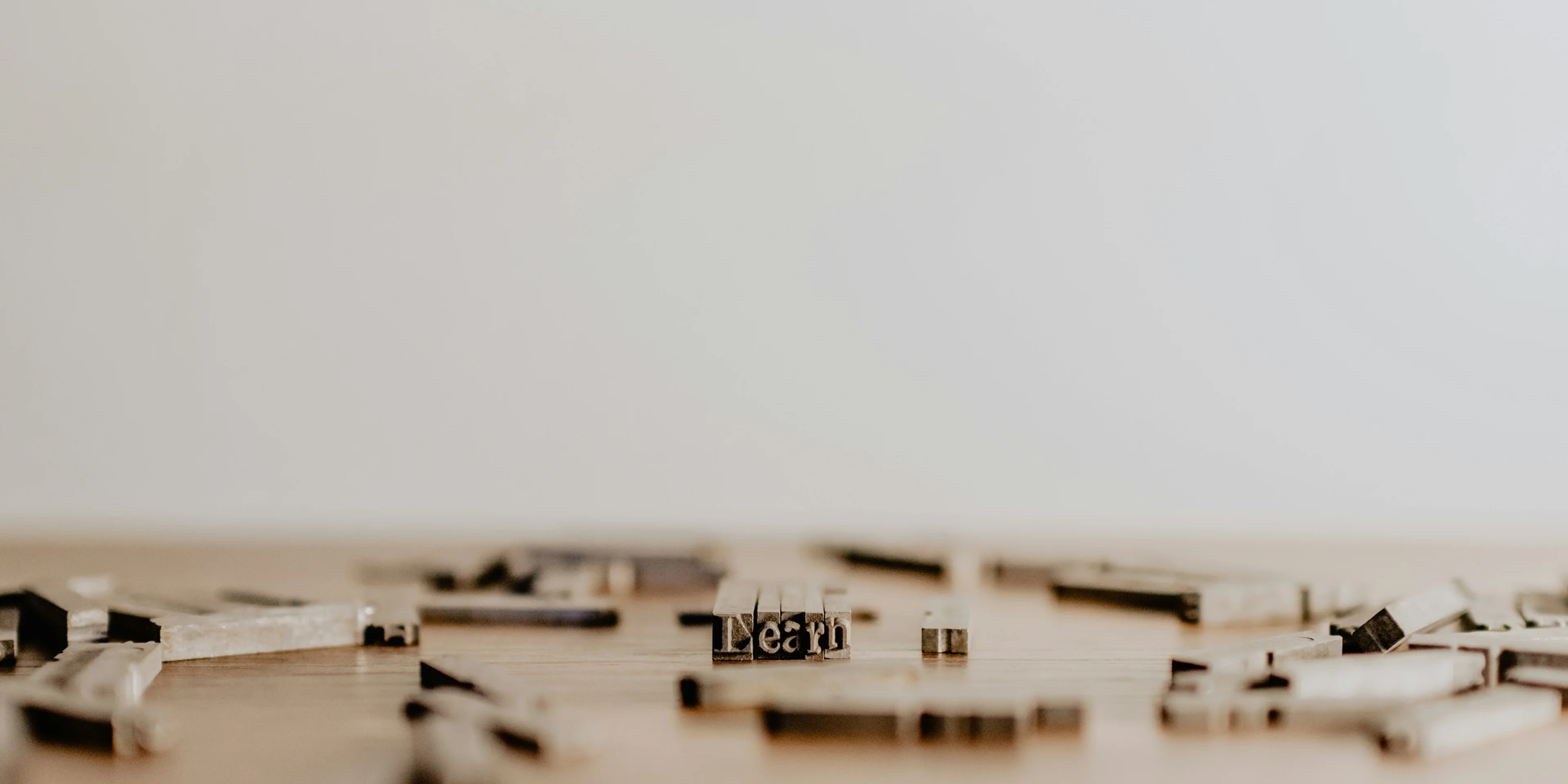 text blocks spelling the word learn.