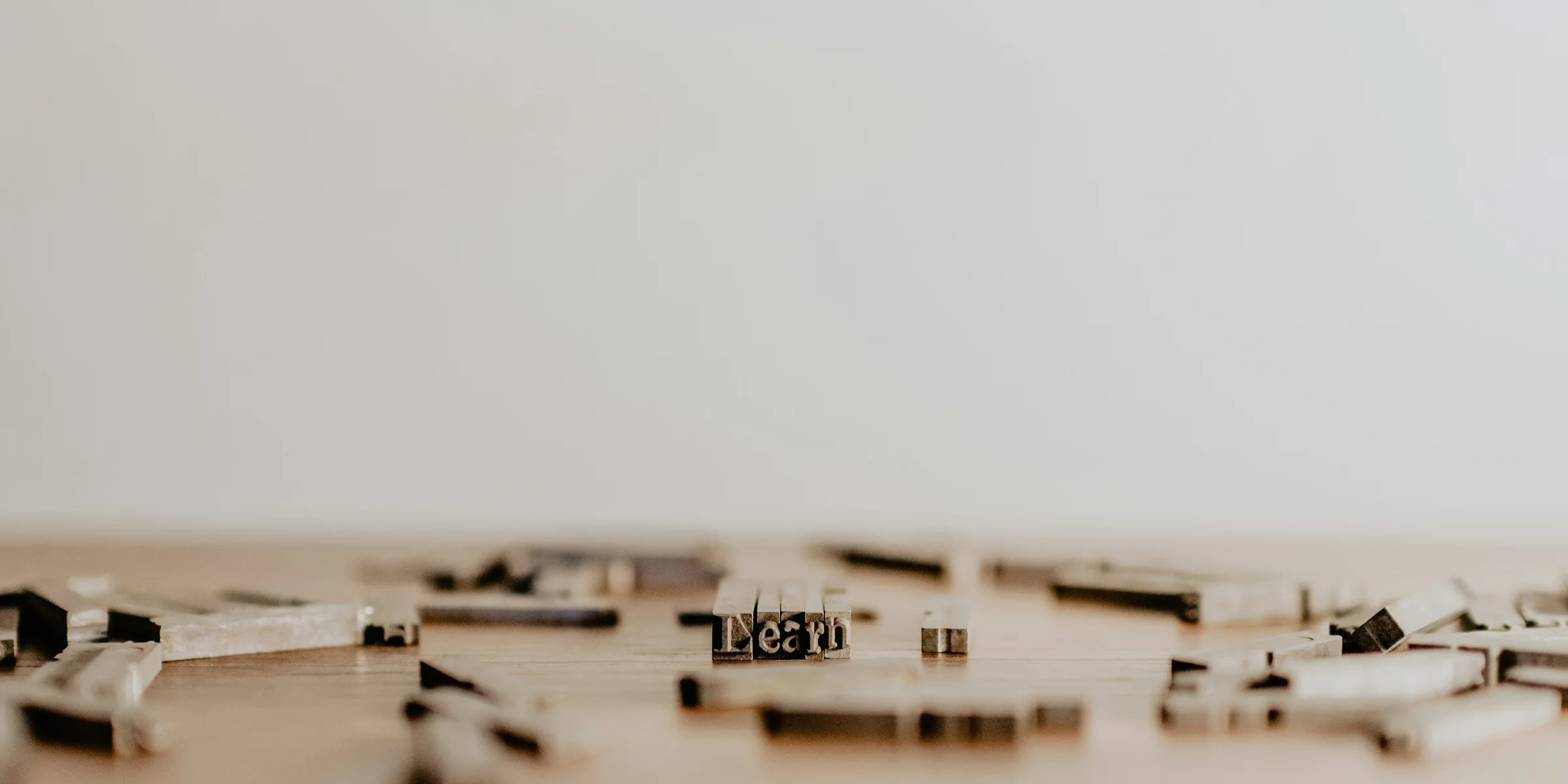 text blocks spelling the word learn.