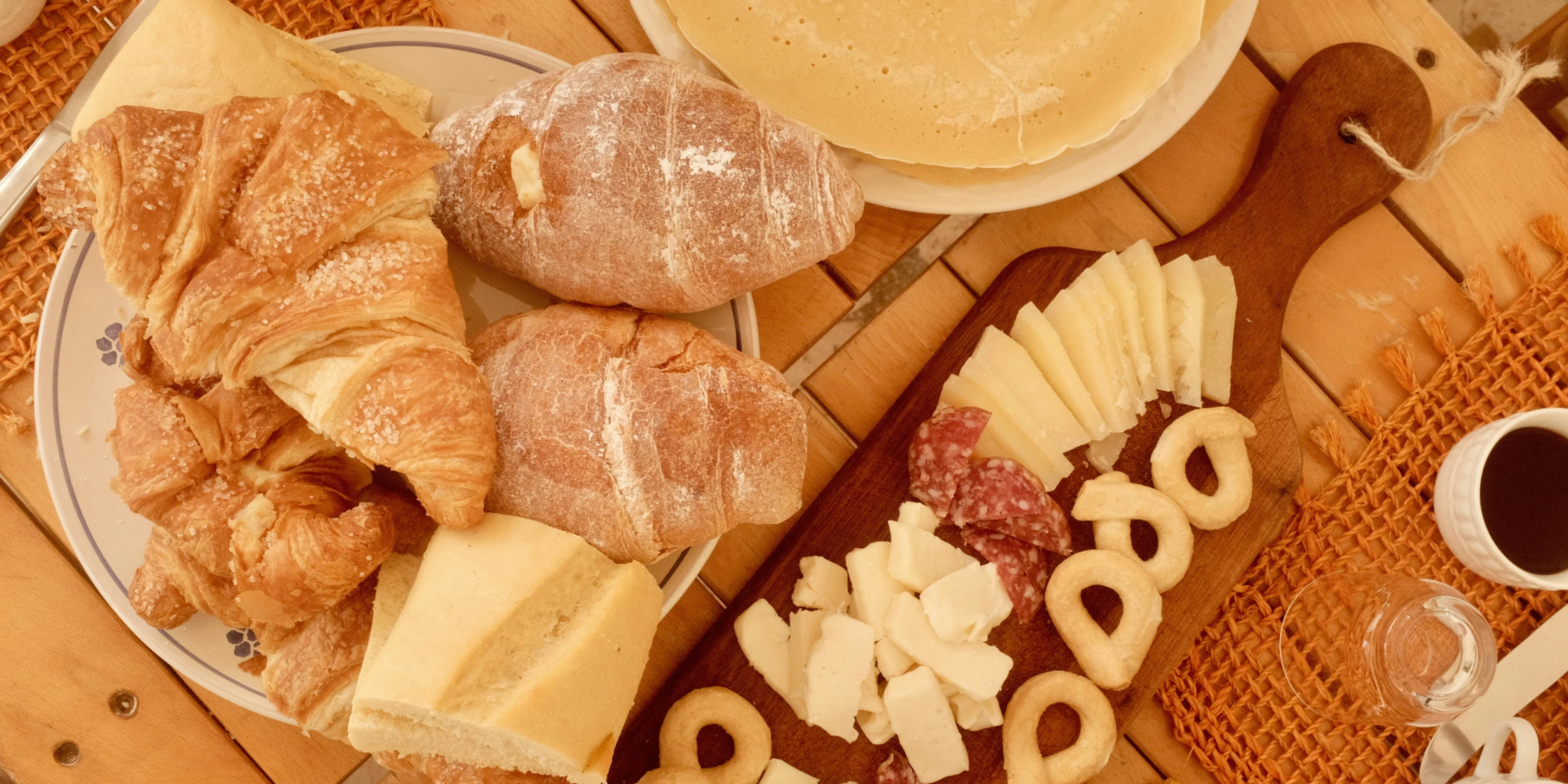 A table topped with lots of different types of food.