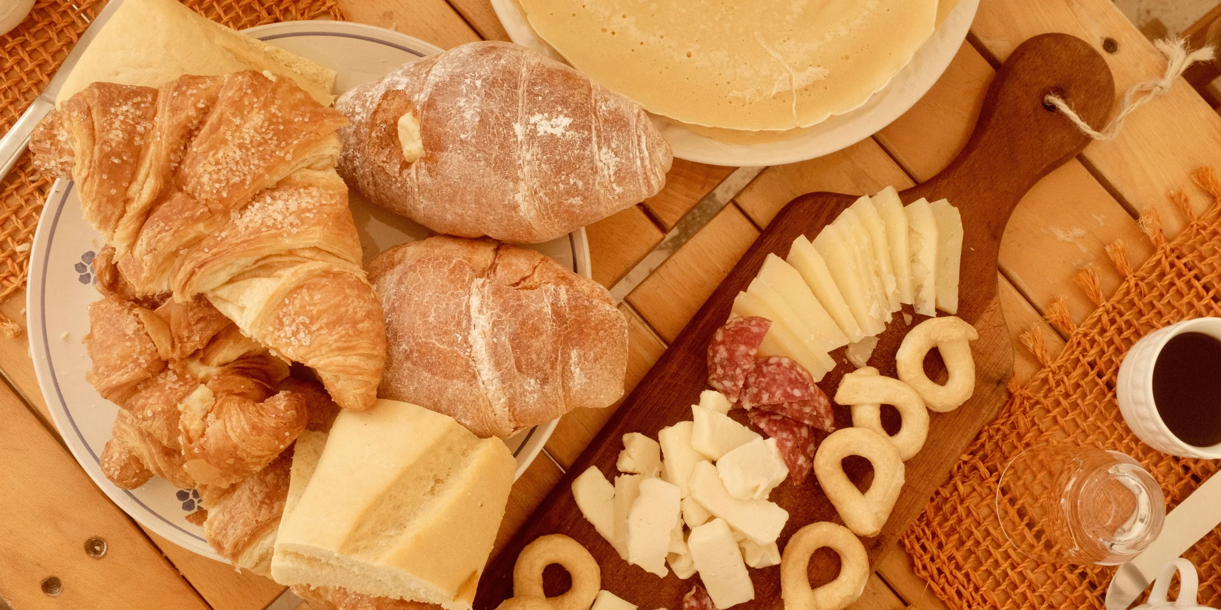 A table topped with lots of different types of food.