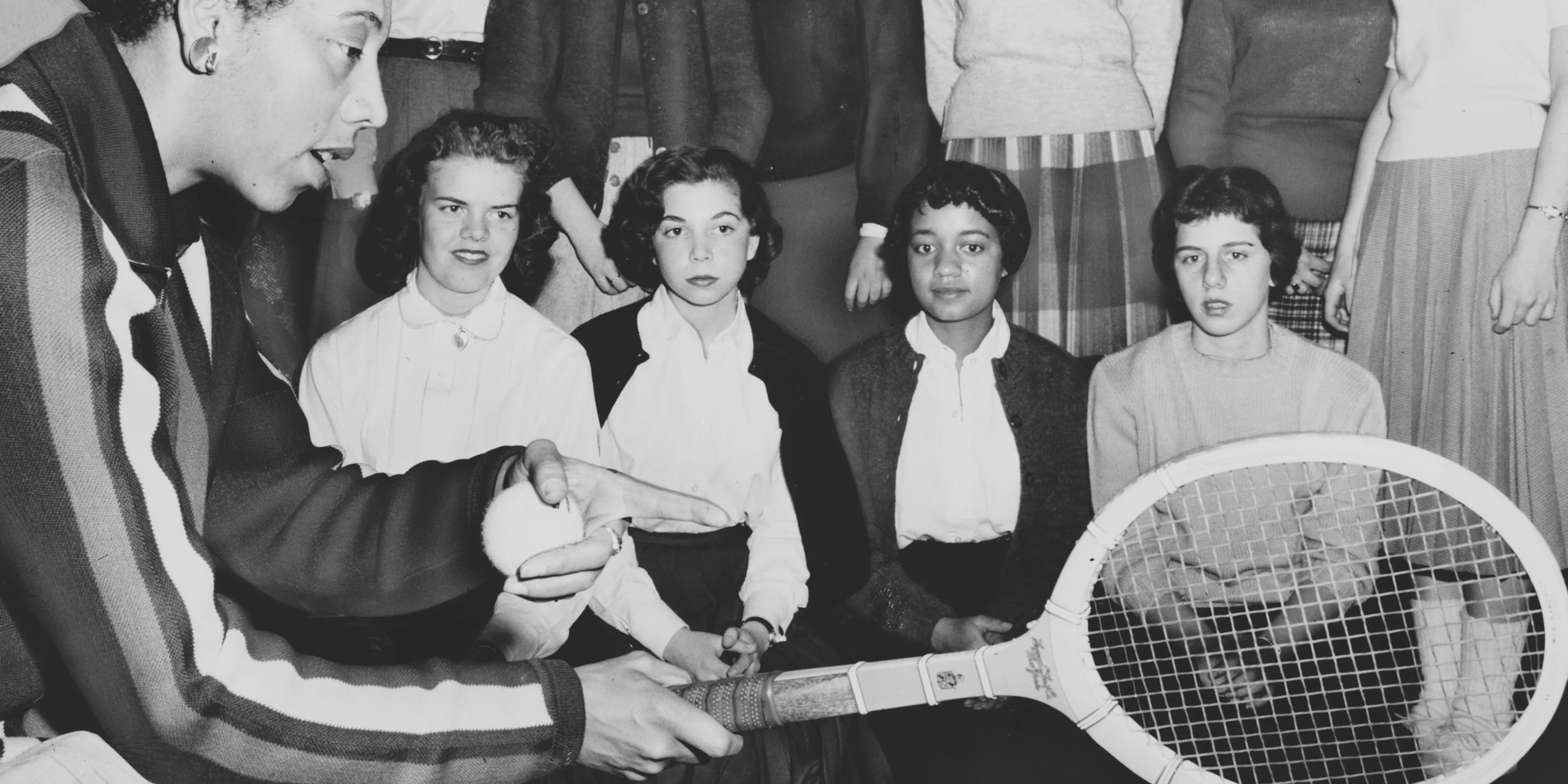 Tennis talk Althea Gibson, U.S. and Wimbledon tennis champion, gives some pointers on the game which has brought her international fame