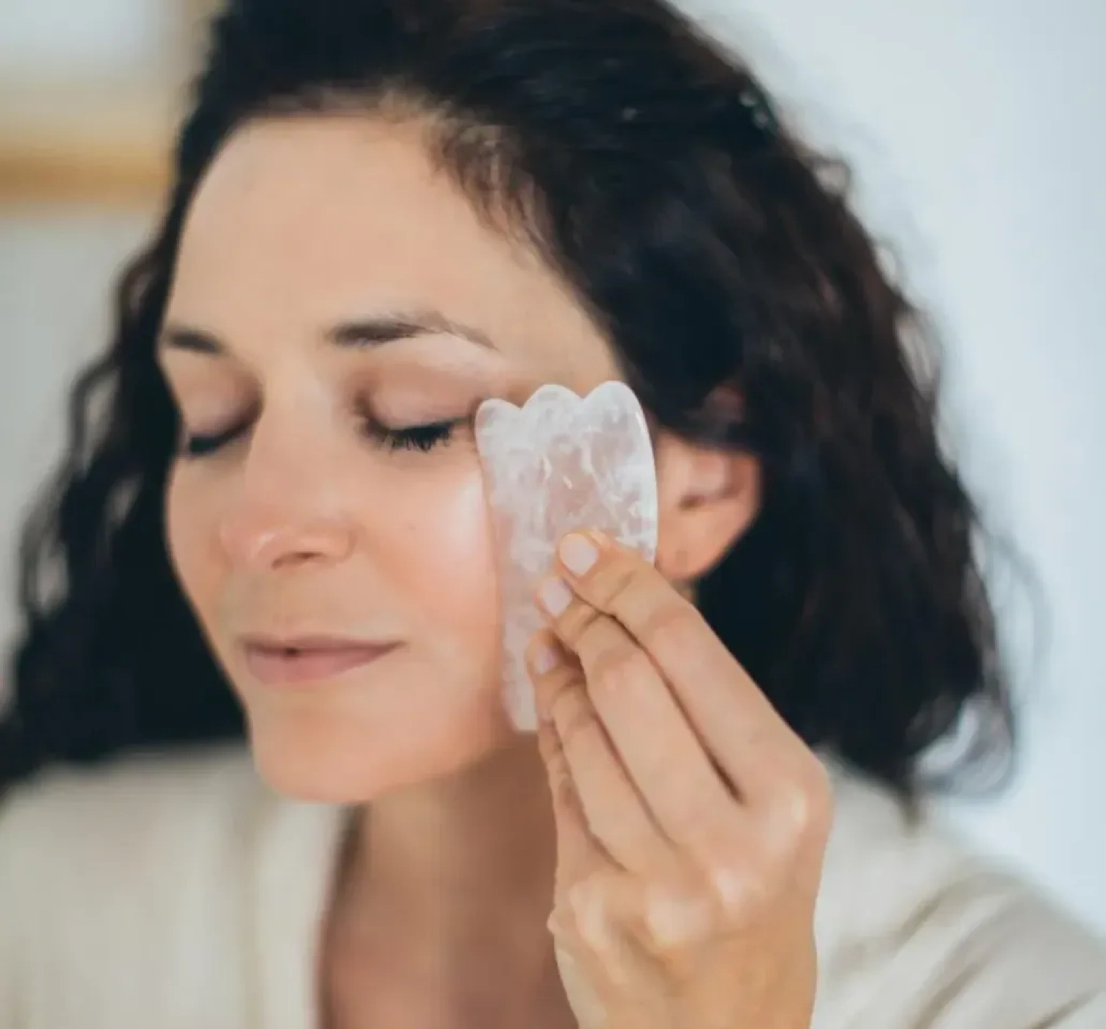 Self-care imagery featuring Rose Quartz Gua Sha Tool