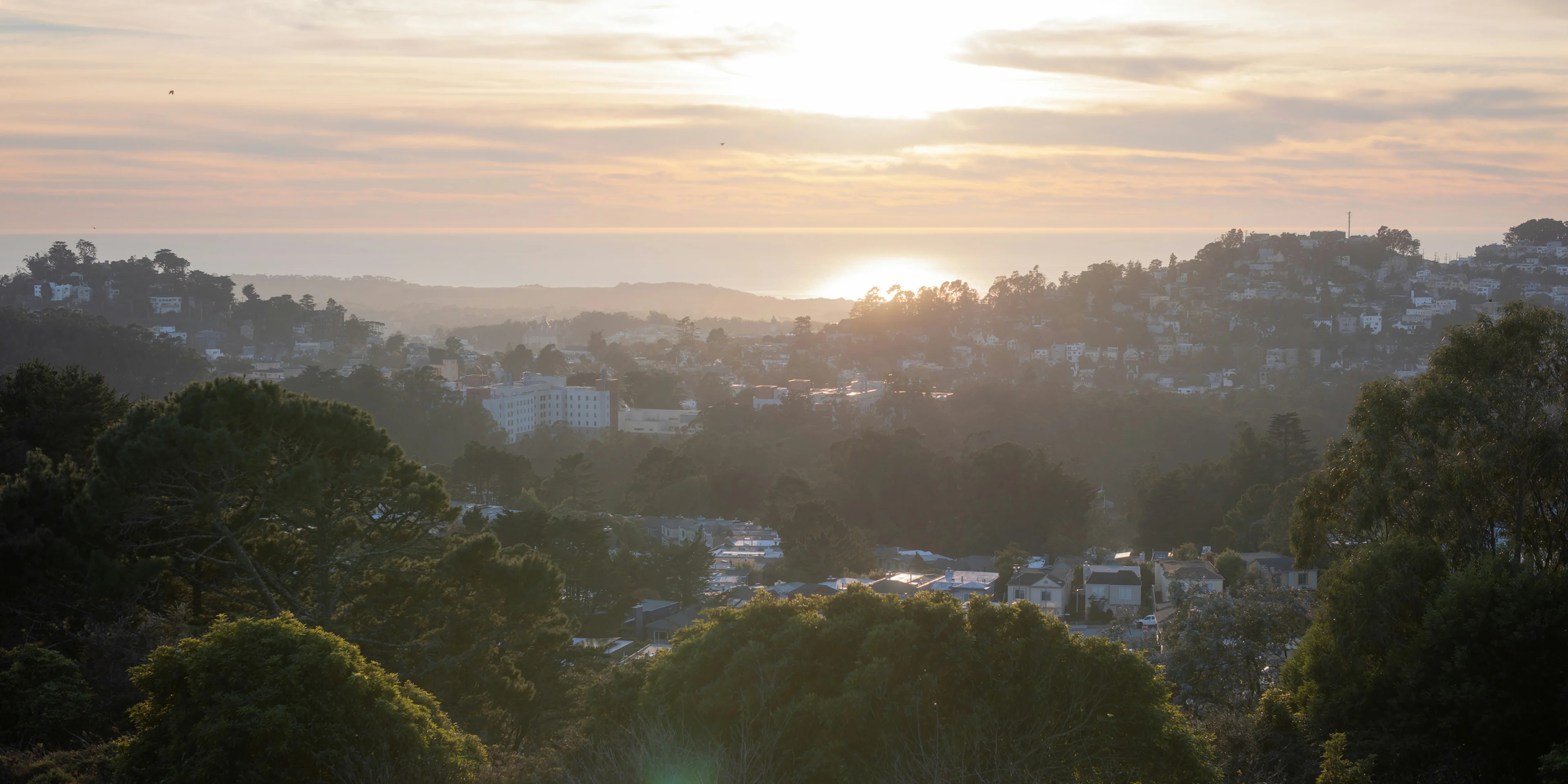 Sunrise illuminates the landscape and the sea..