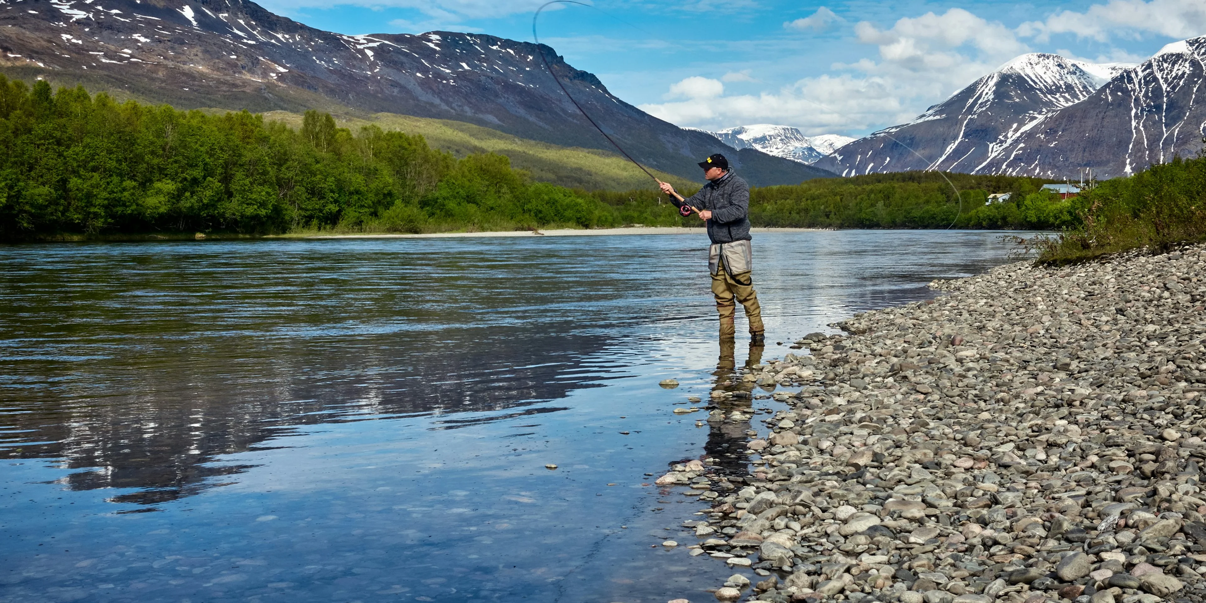 man fishing on the river.