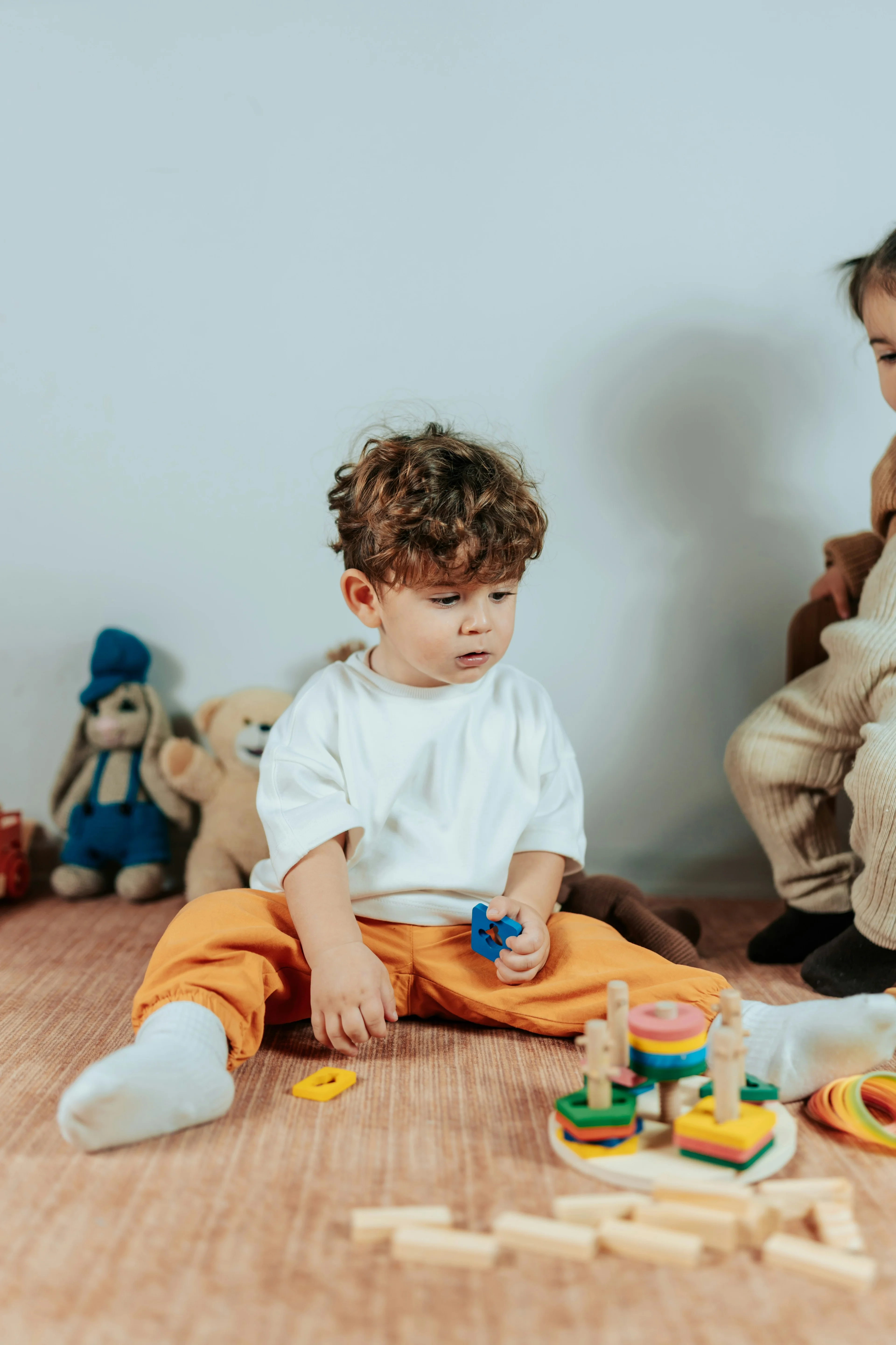 child playing with toys