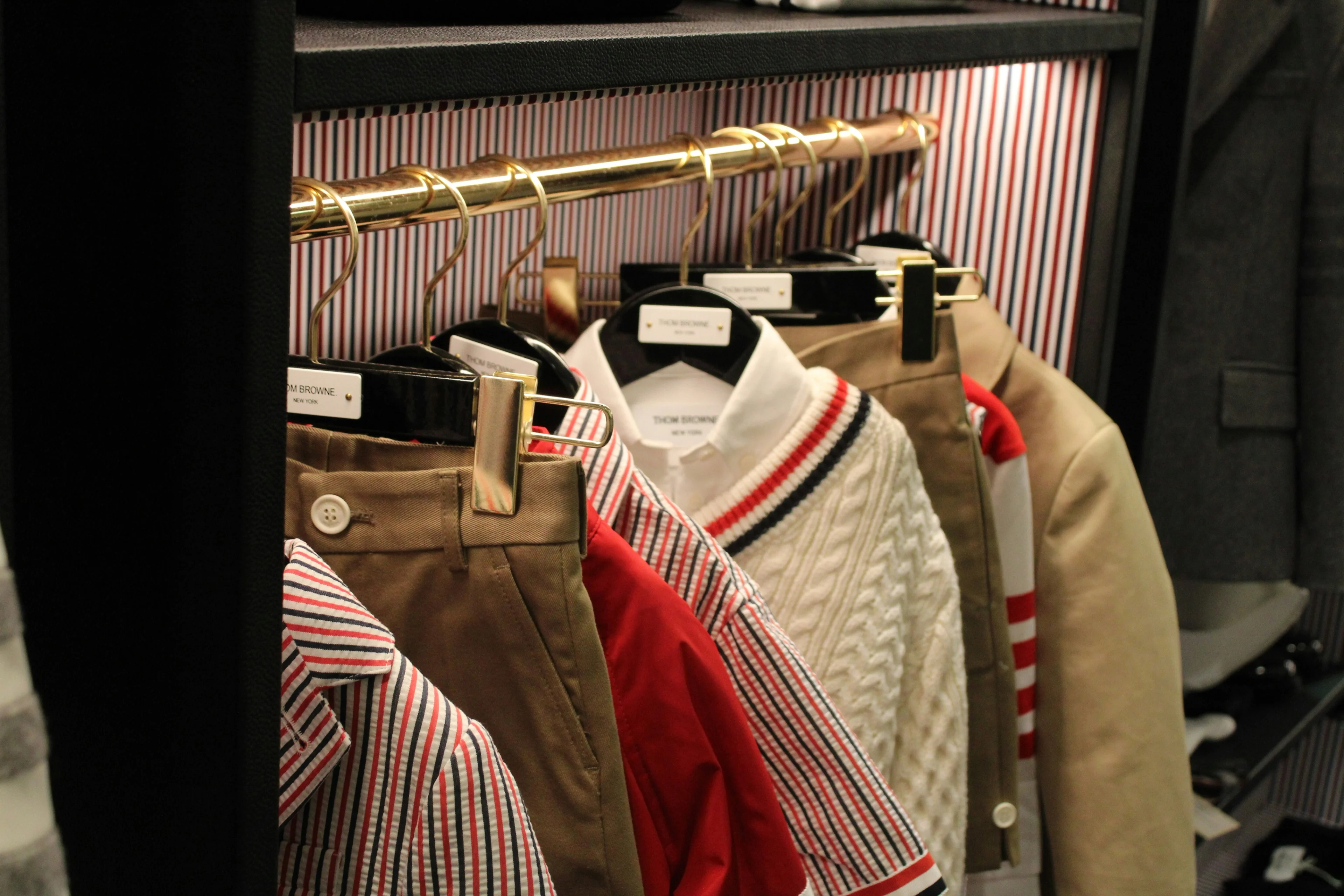 tommy hilfiger clothing on a rack
