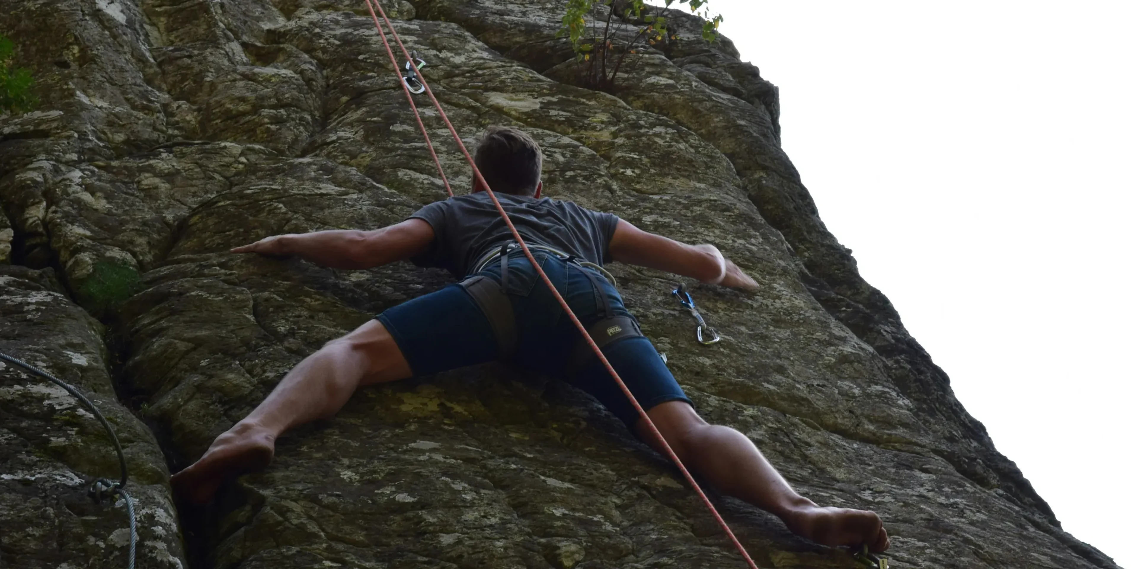 a man rock climbing