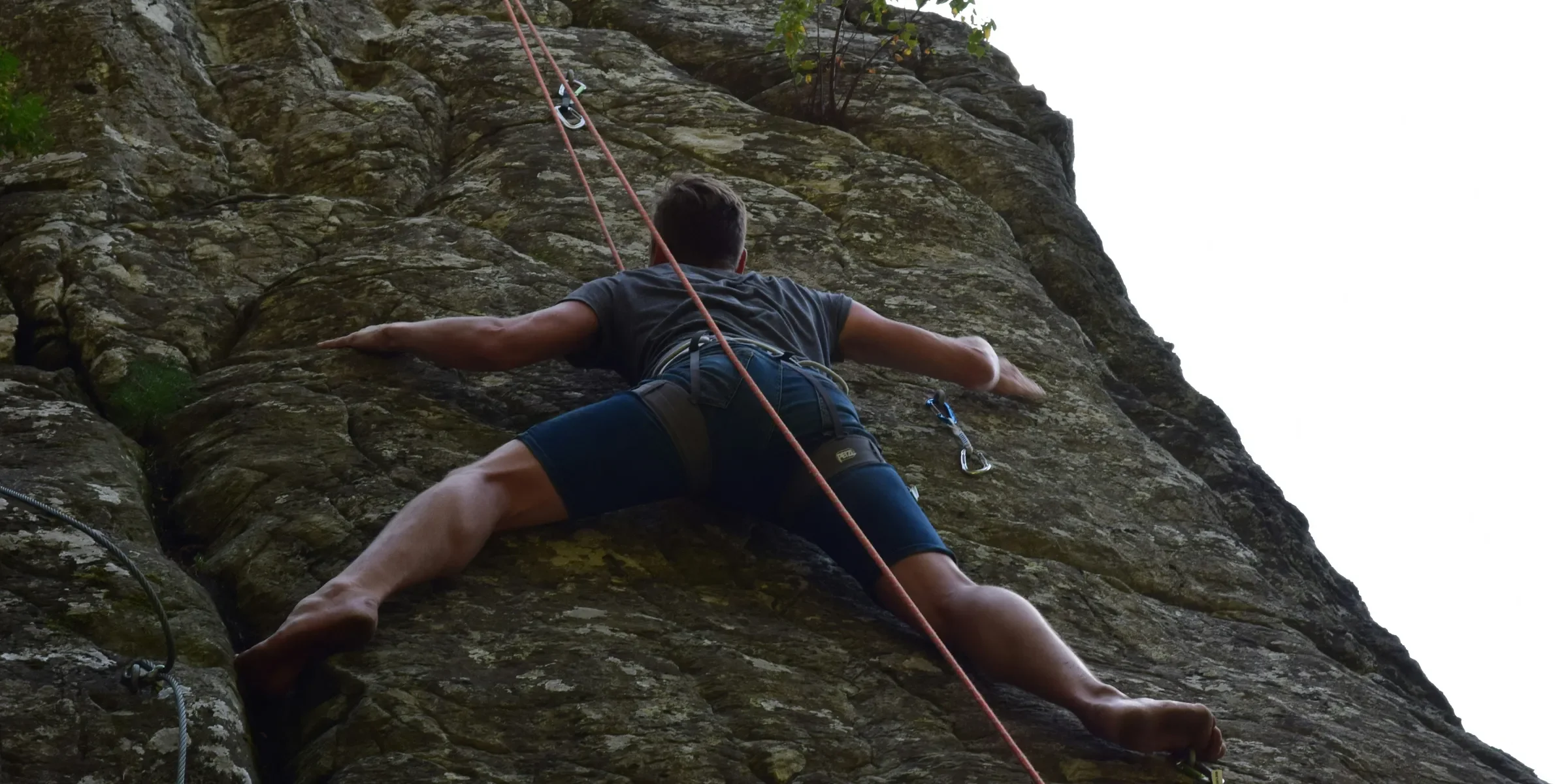 a man rock climbing