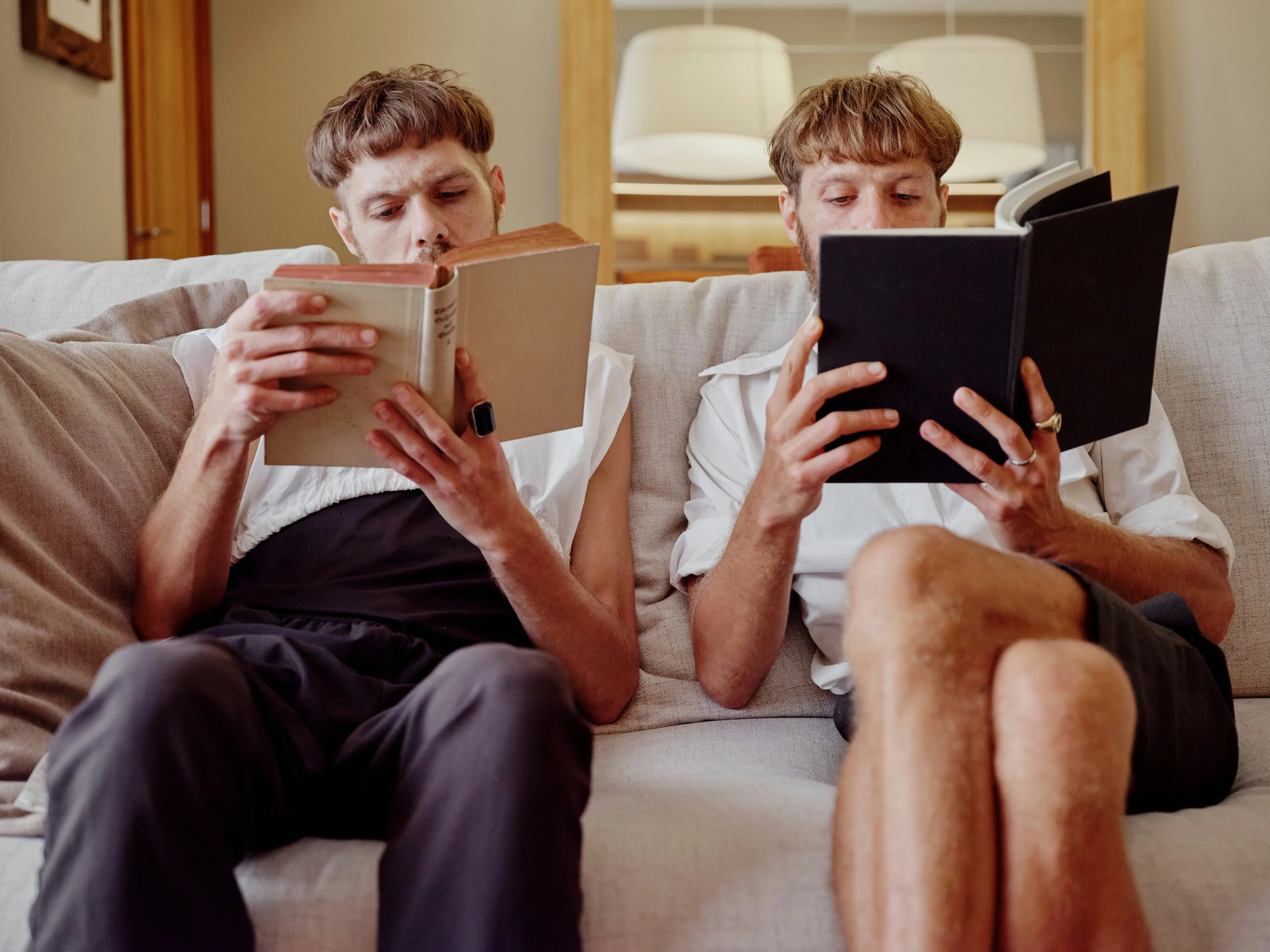 two people reading books