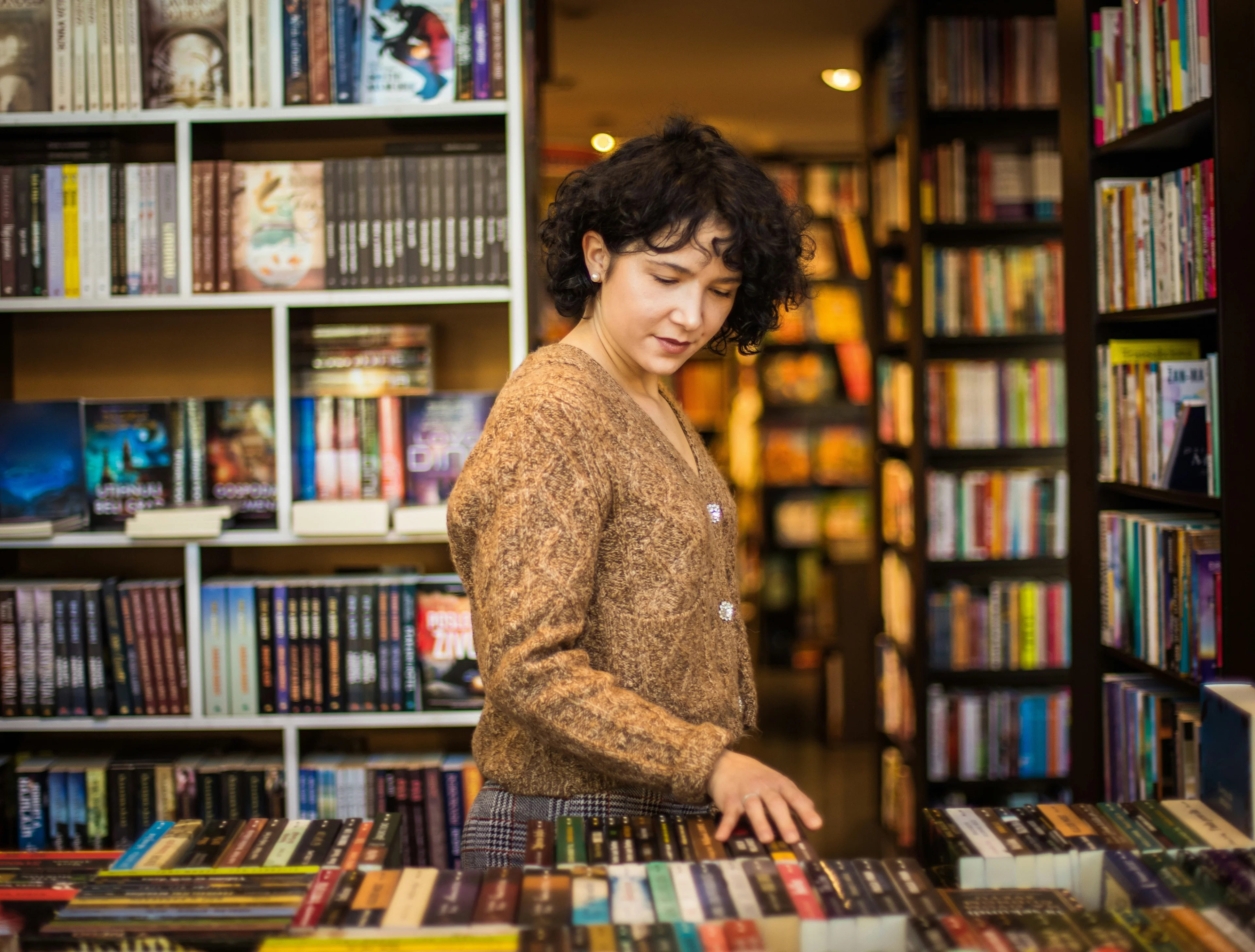 person scanning books