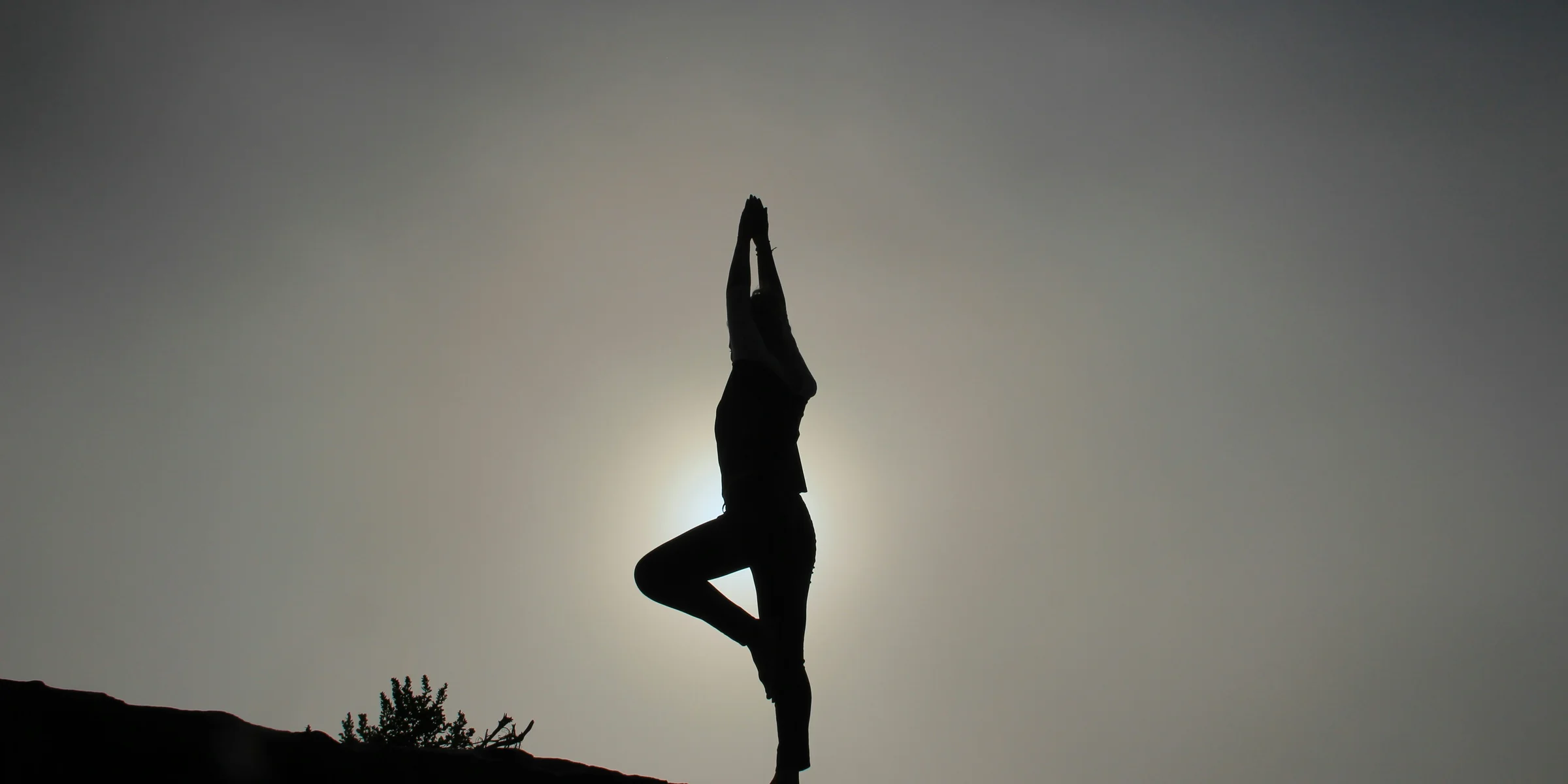 person doing yoga exercises.