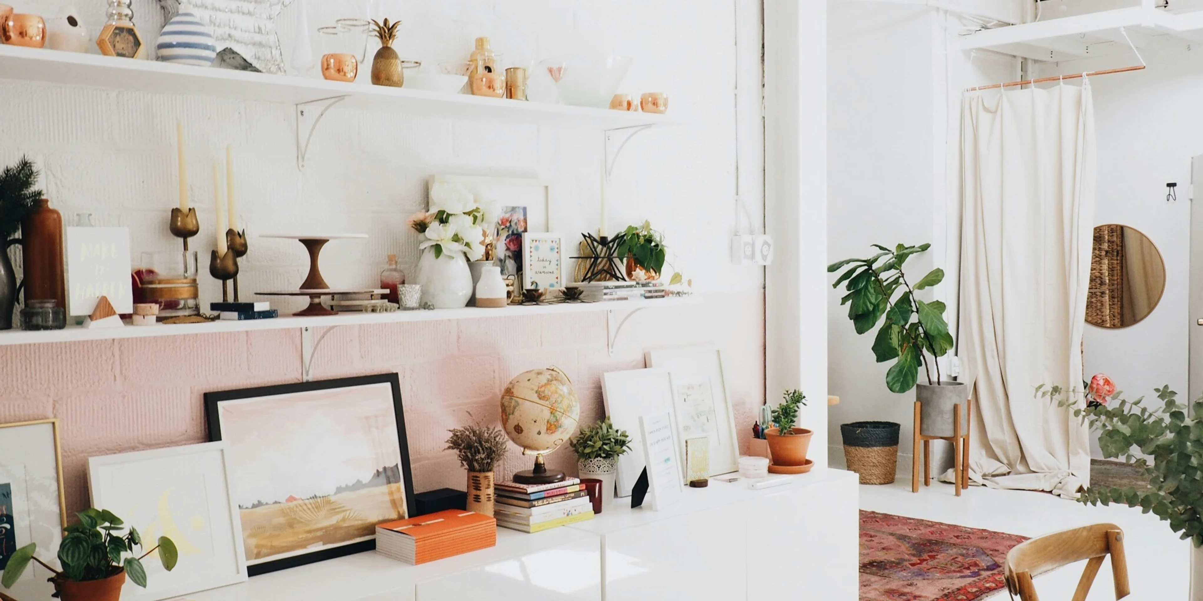 white wooden shelf and decors