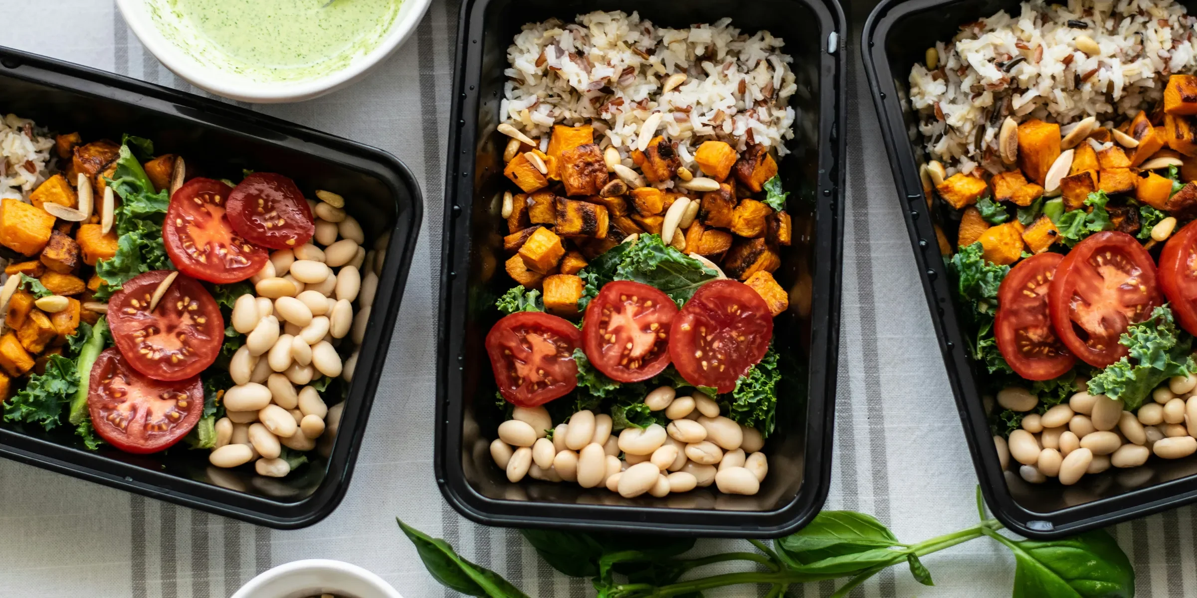 a group of trays with food