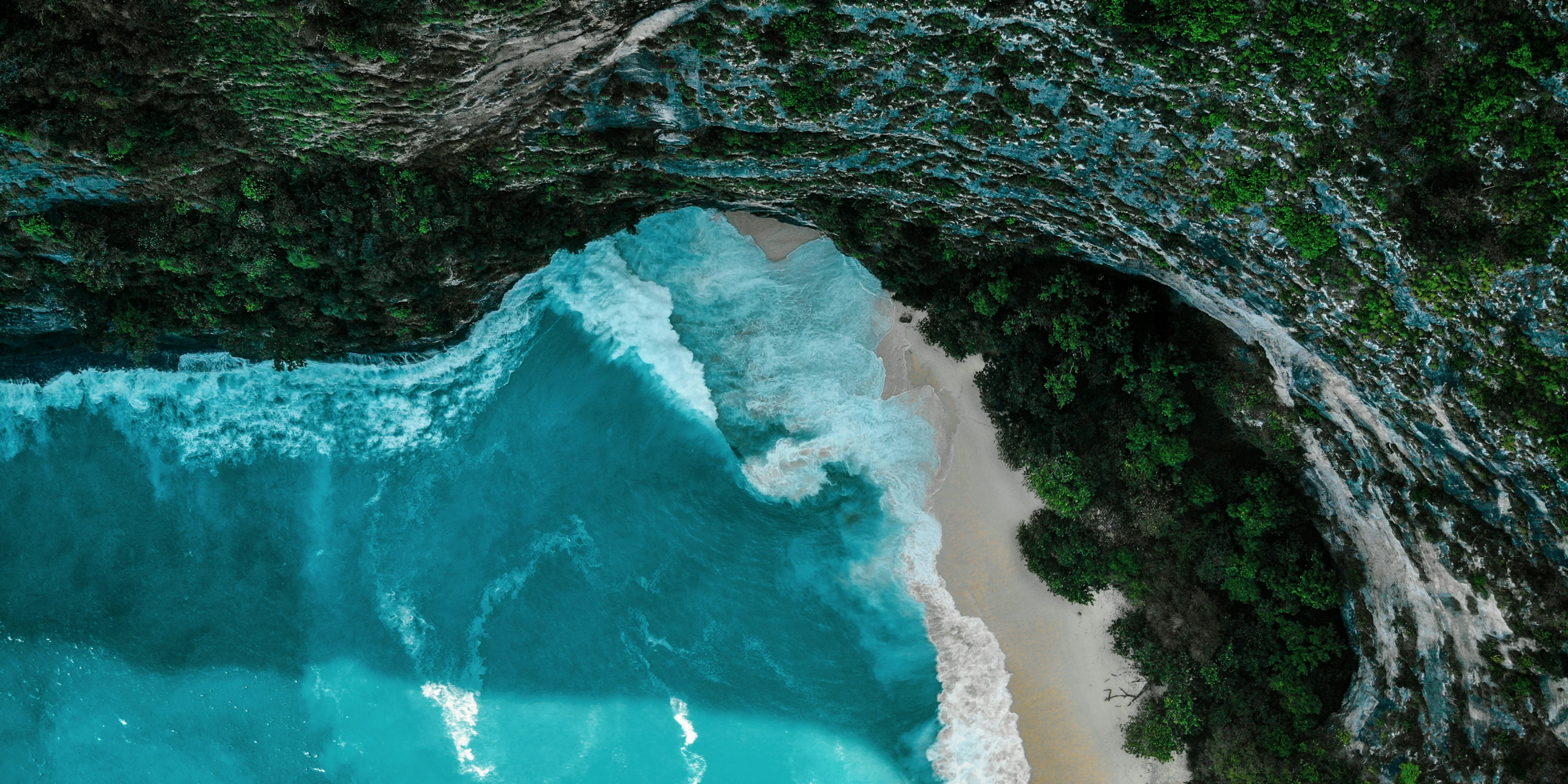 white sand beach during daytime.