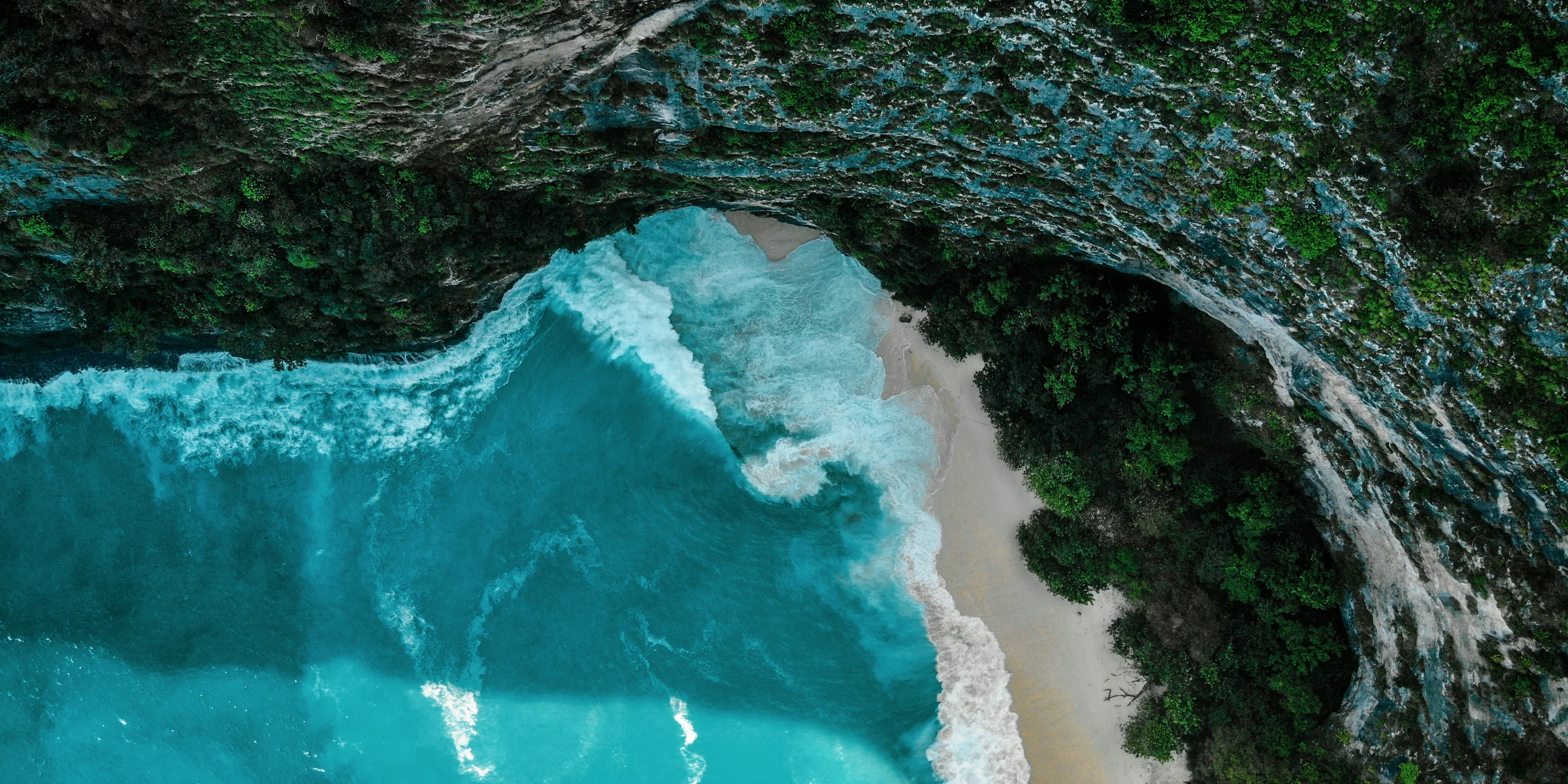 white sand beach during daytime.