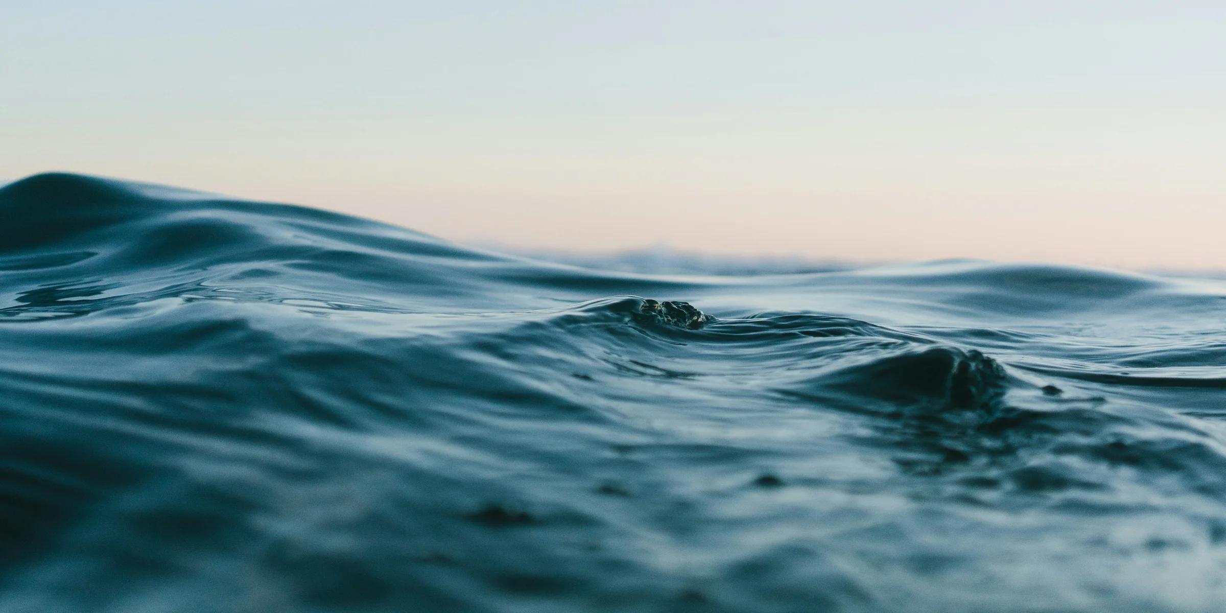 body of water under sky.
