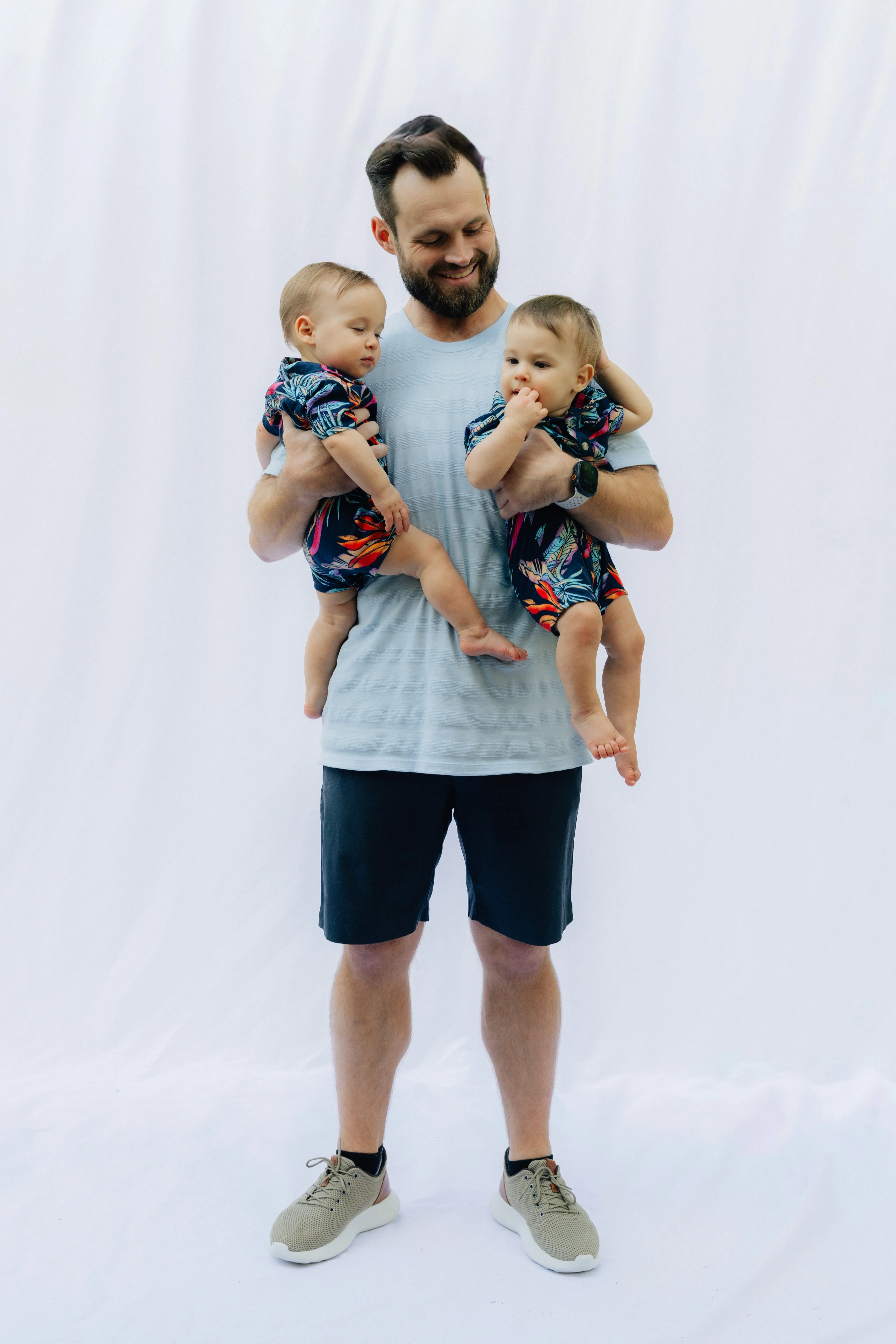 dad with two babies