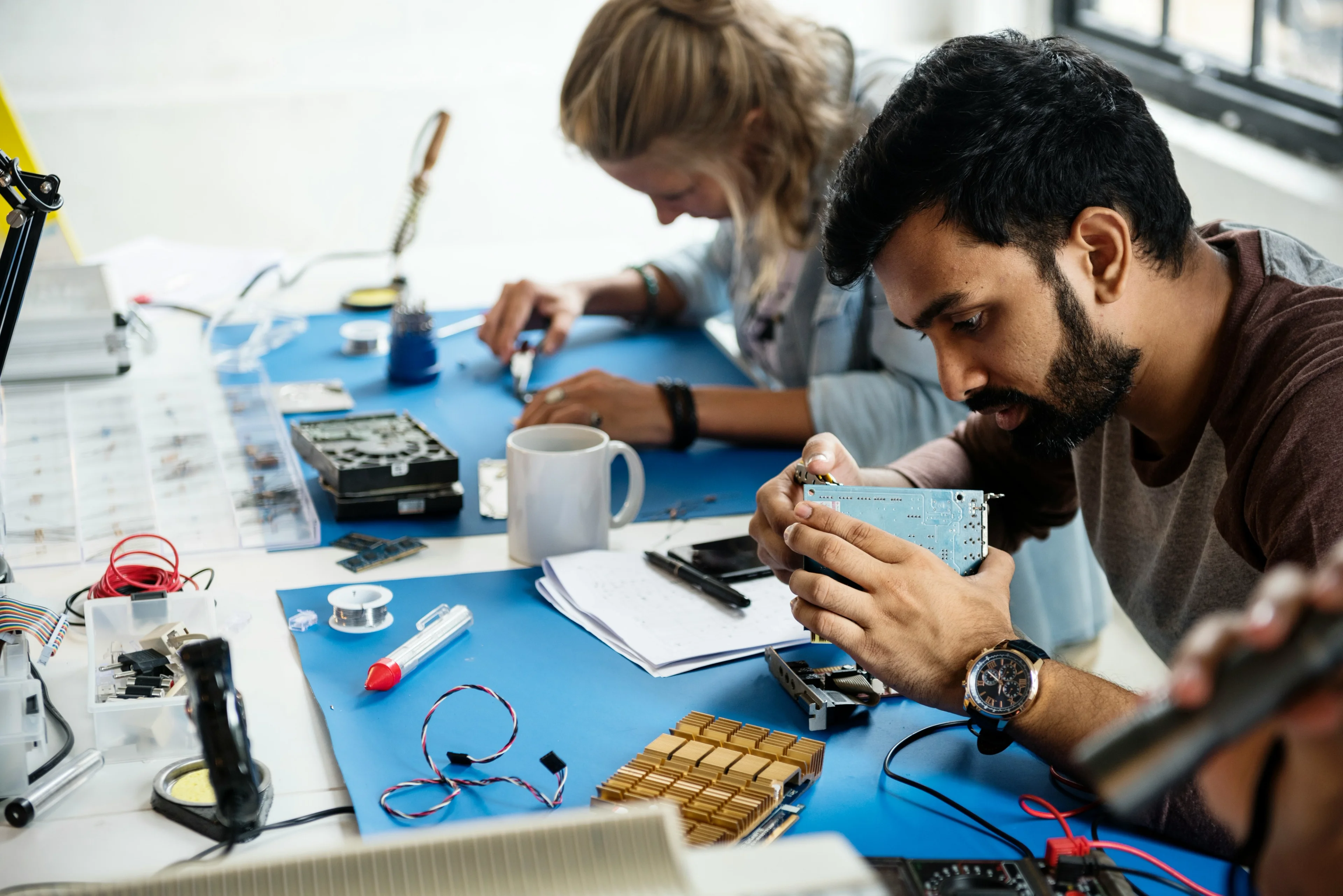 people working on computer chips
