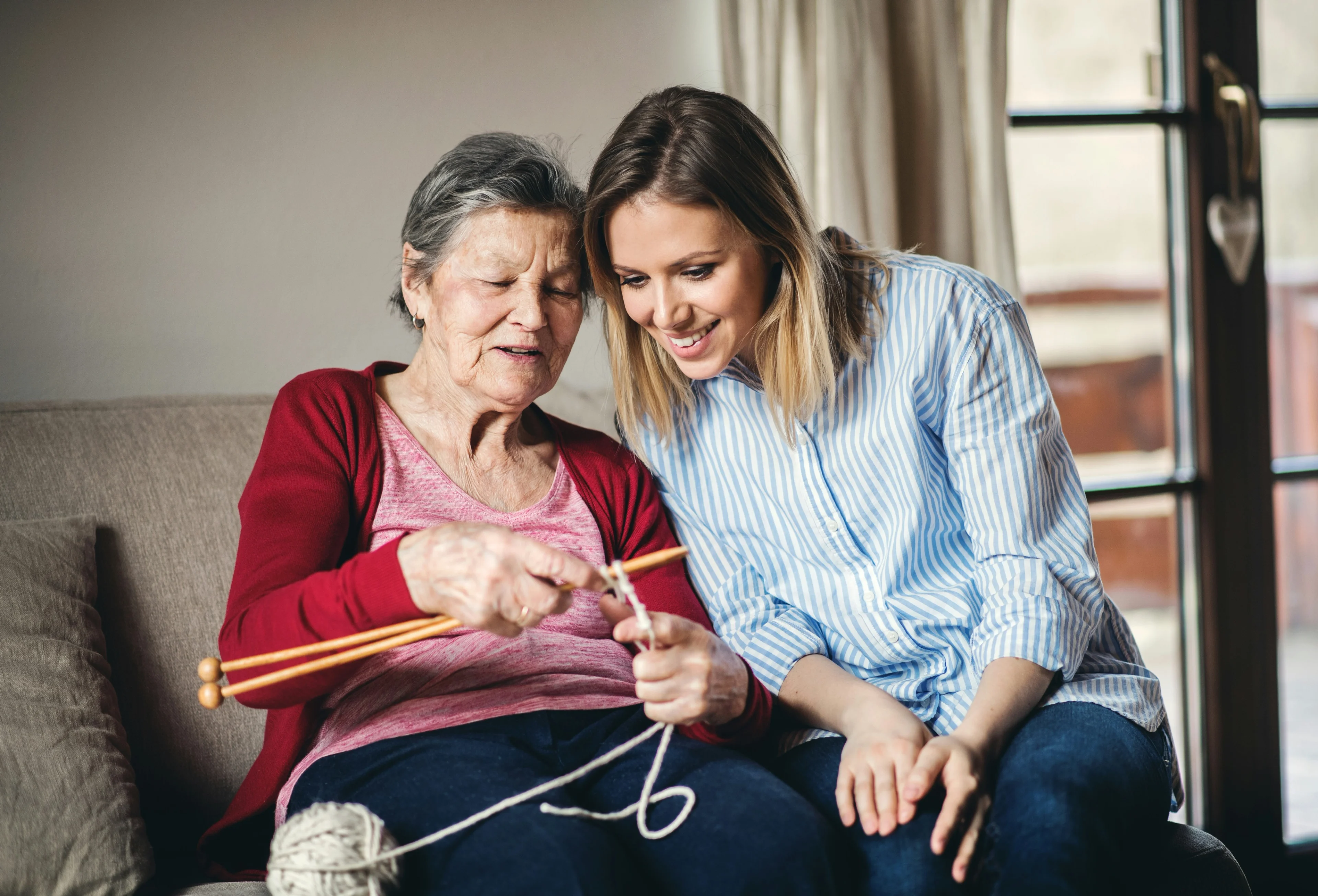 Happy person crafting with yarn