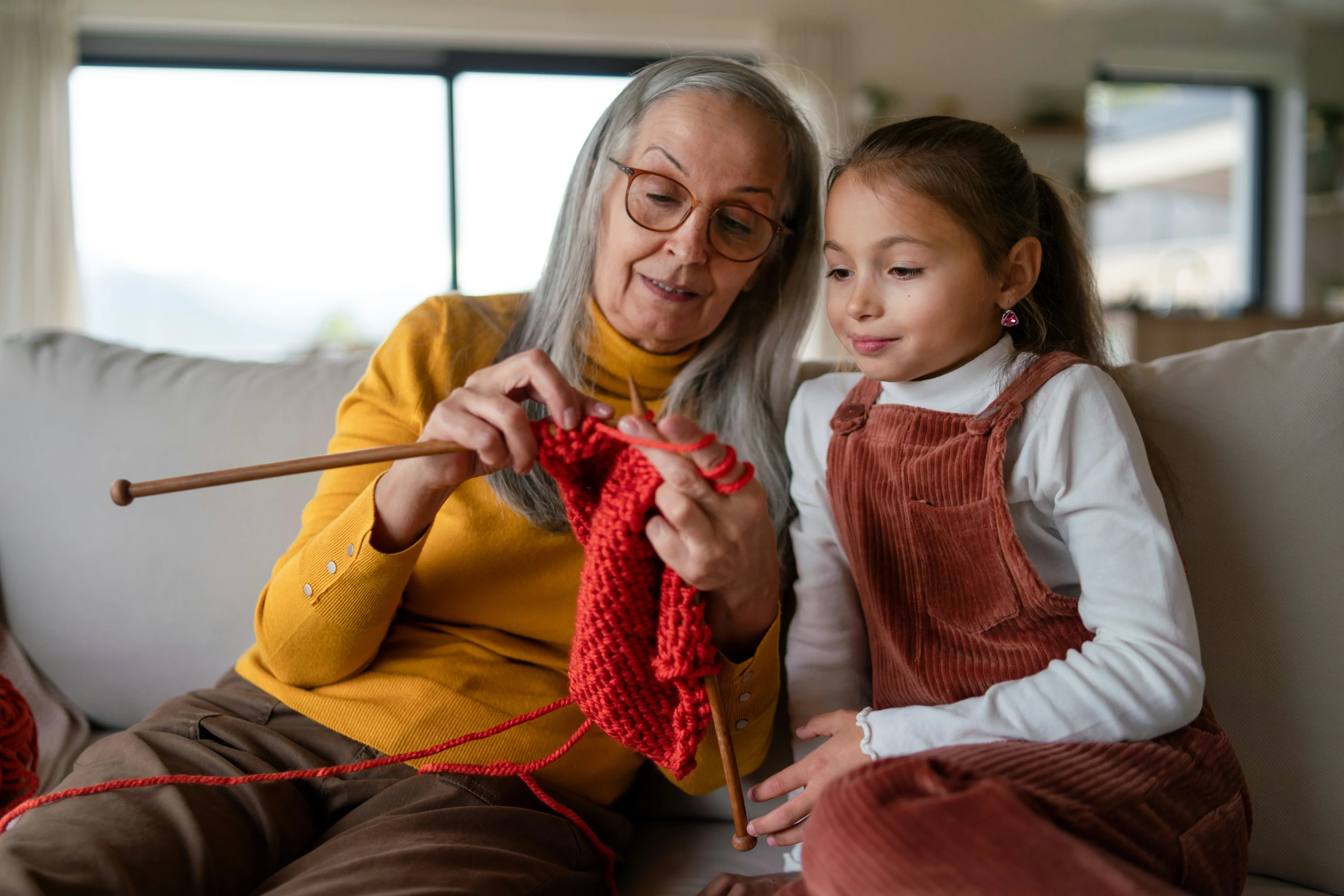 grandma and grandchild knitting
