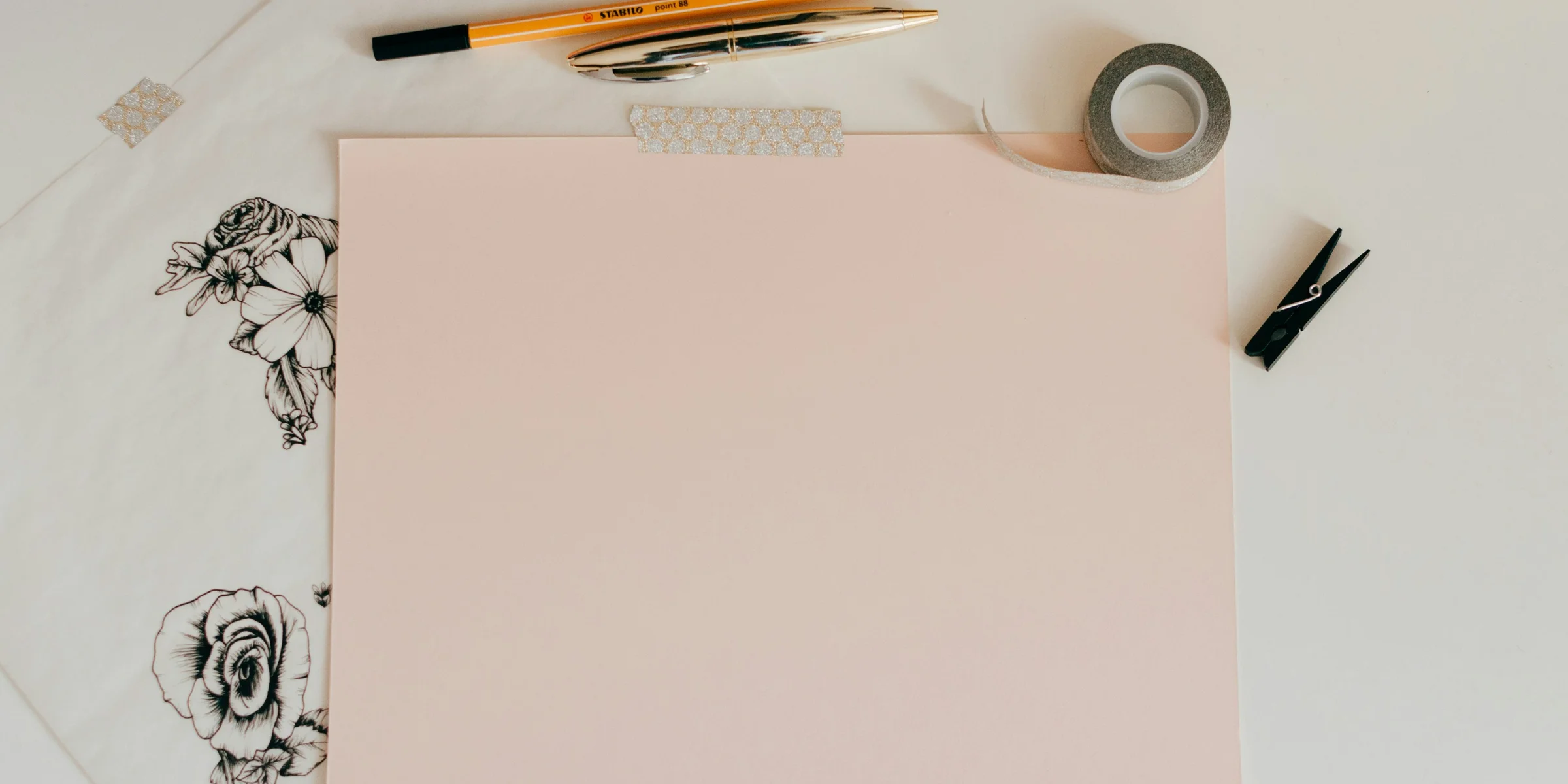 white board beside pencil and tape.