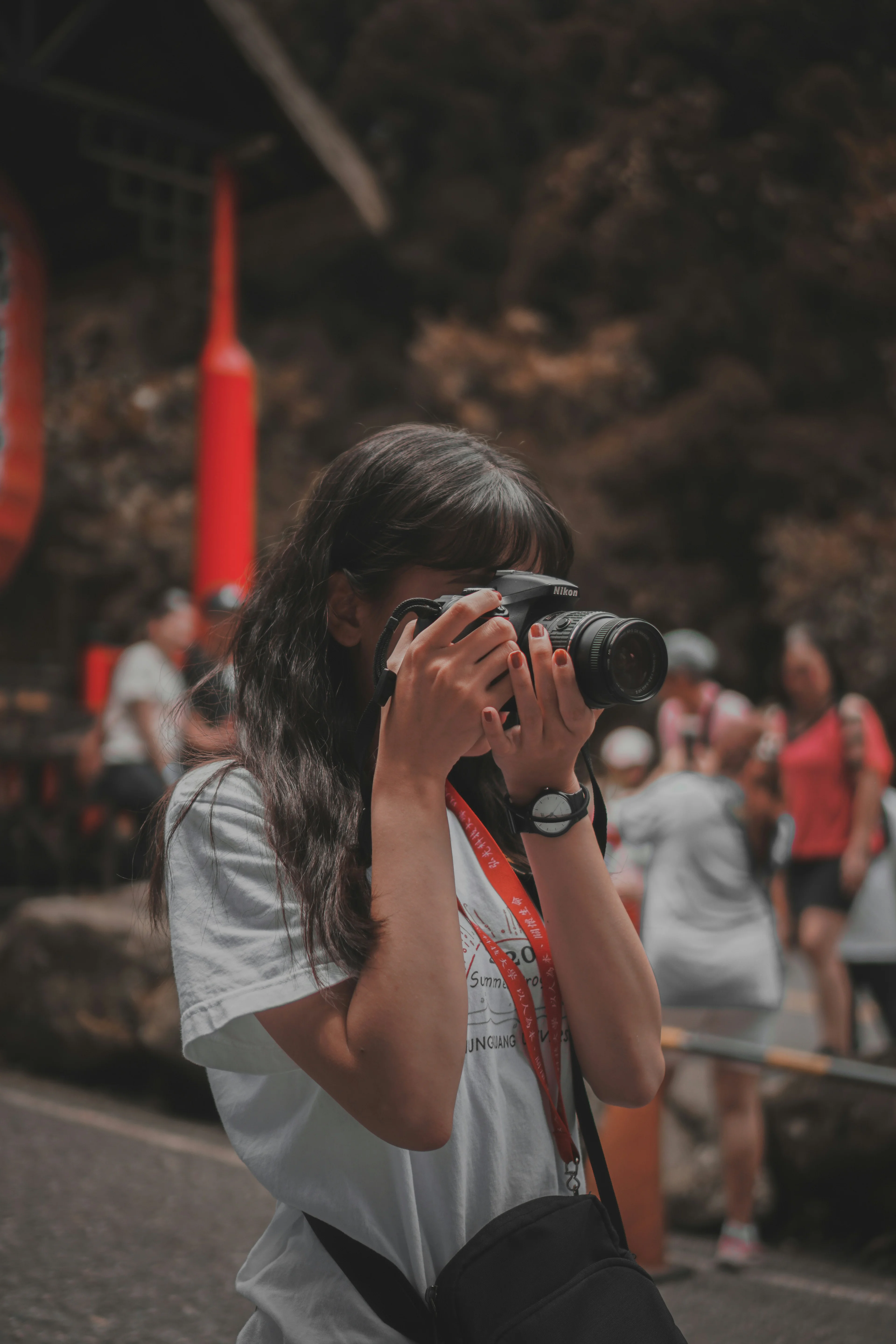 girl taking a photograph