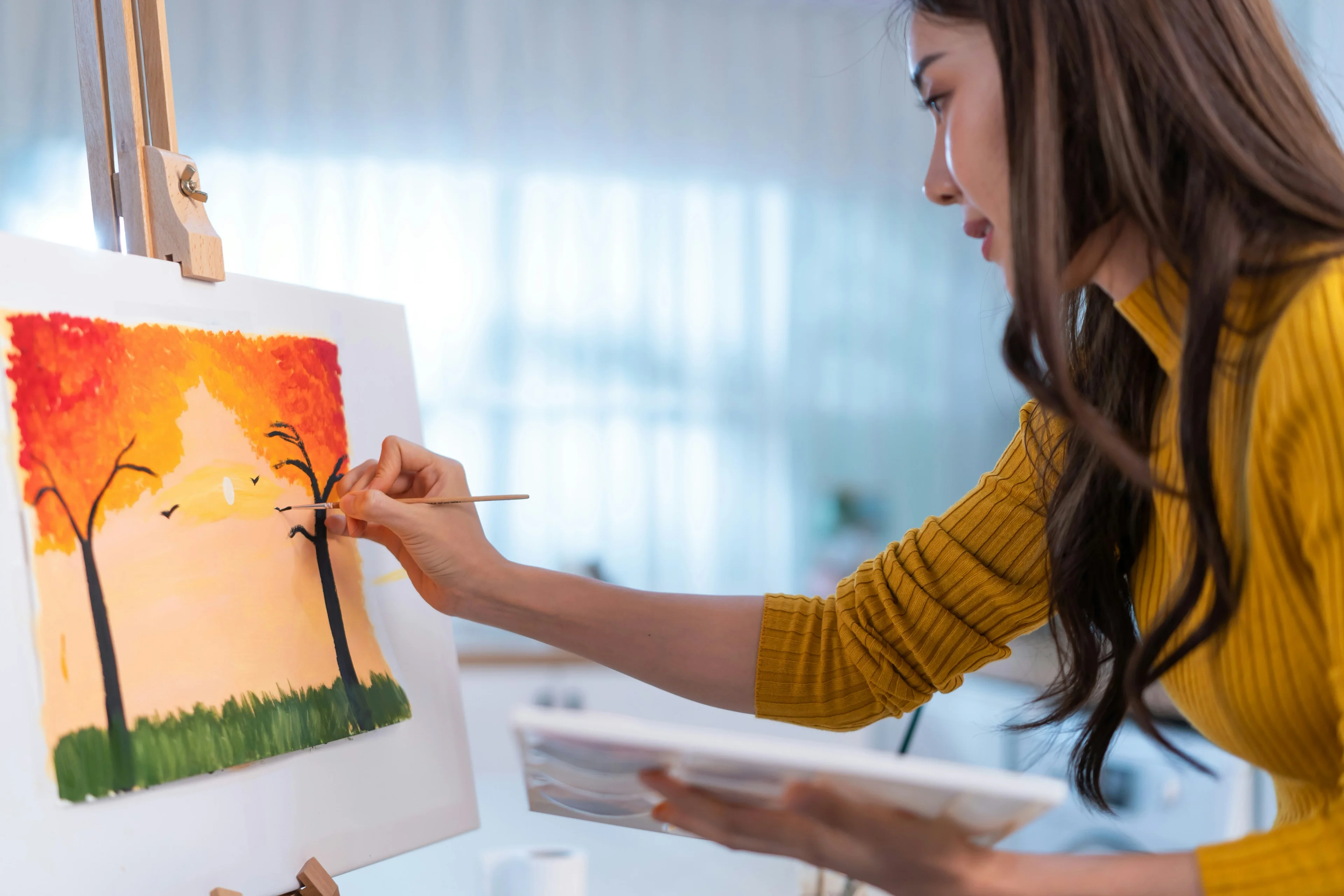 Happy person doing art