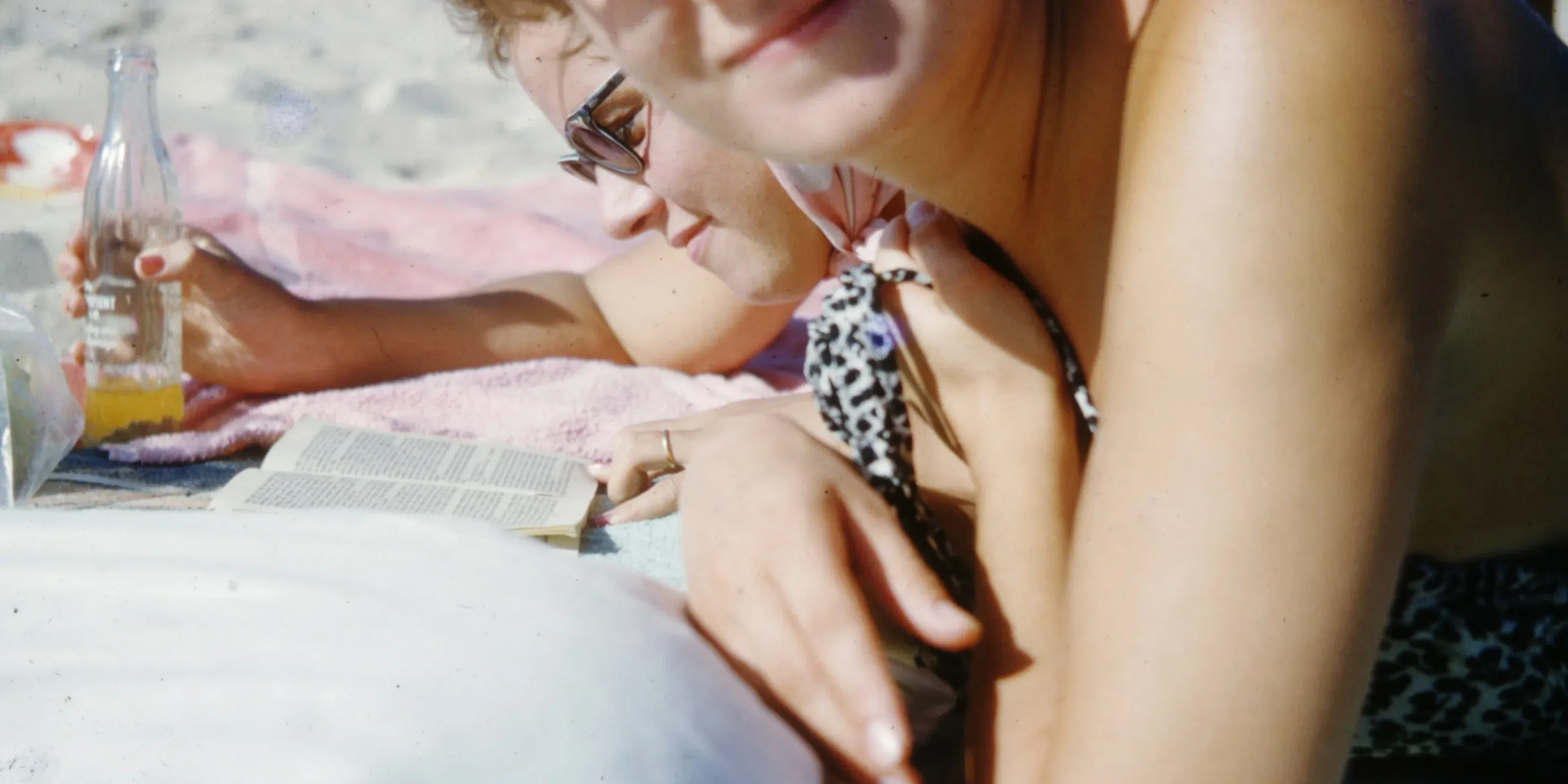 woman in black and white polka dot bikini top wearing sunglasses